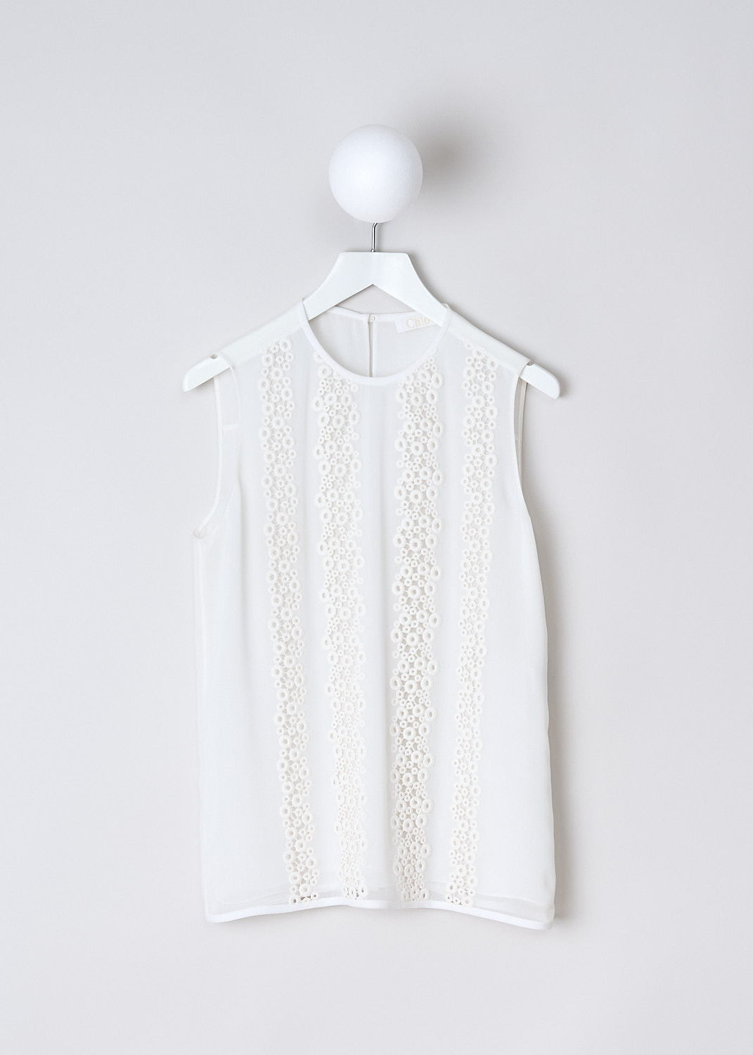 CHLOÉ, SLEEVELESS TOP WITH EMBROIDERED DETAILING, 14AHT15_14A005_MILK, White, Front, This sleeveless semi-sheer top is made in a milk white crêpe fabric. The top has a high round neckline with a single button closure in the back of the neck. The top has an embroidered front. The top has a second semi-sheer lining. The hemline is straight. 
