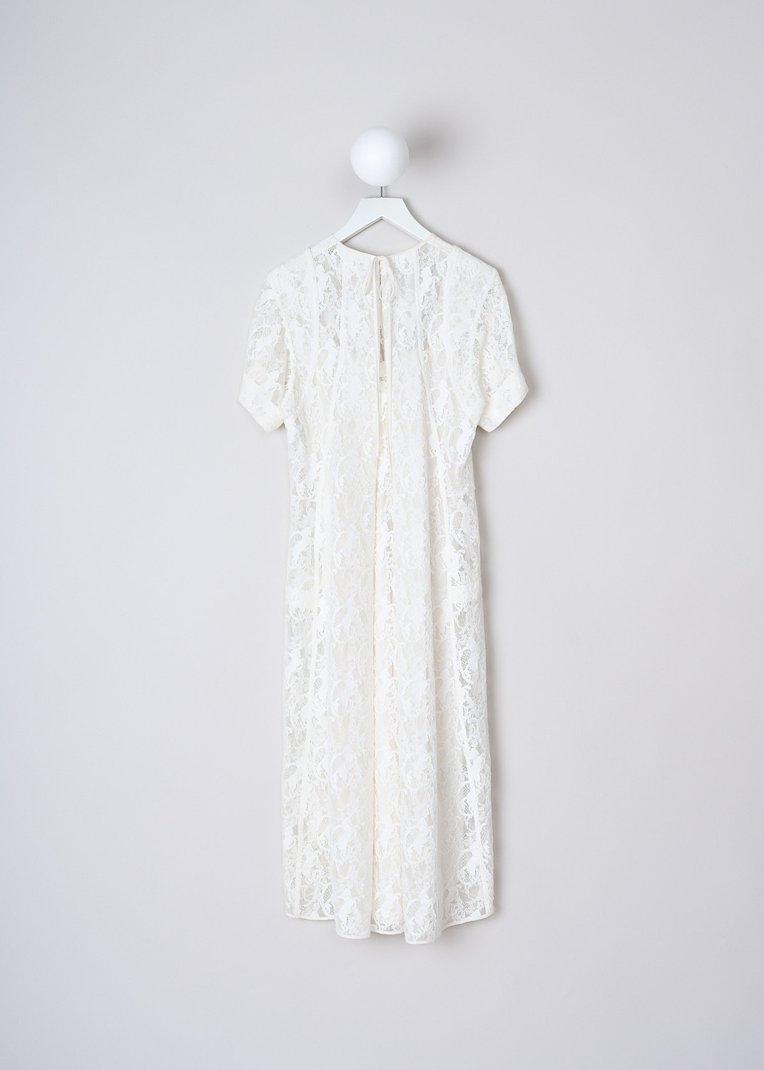 CHLOÉ, LACE MIDI DRESS IN ICONIC MILK, CHC19SRO41416107_ICONIC_MILK, White, Back, This lace midi dress in Iconic White has a round neckline and short sleeves. The dress has an asymmetric hem. In the back, a drawstring functions as the closure and creates a kick pleat on the back. The dress comes with a white slip dress.  

