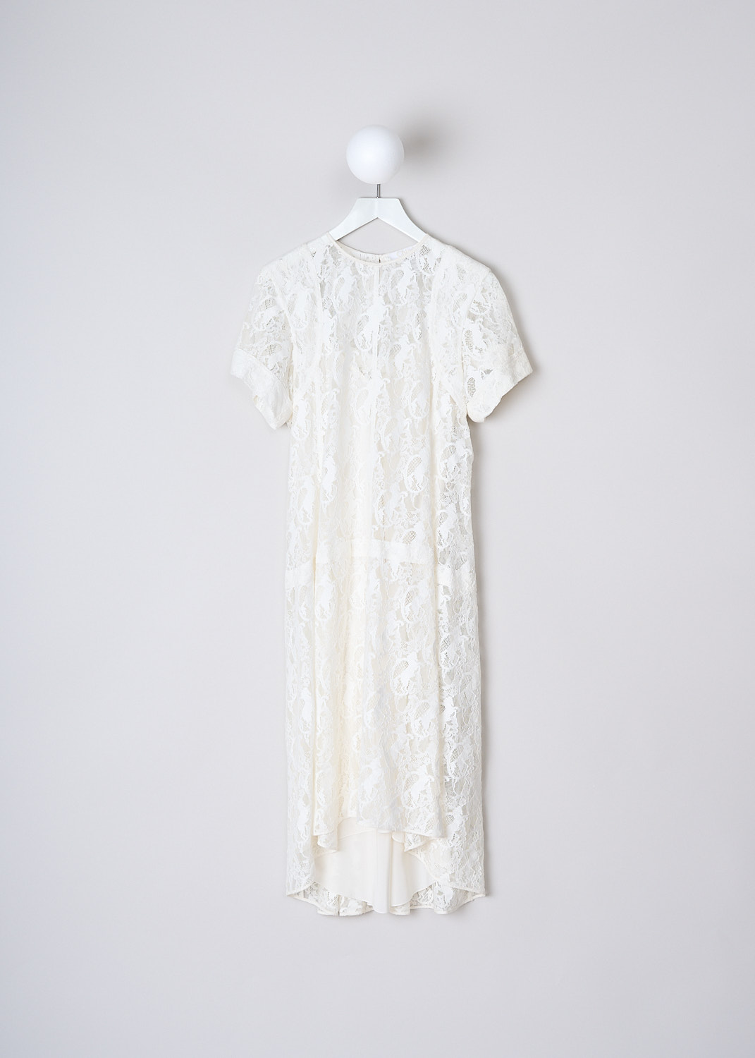 CHLOÉ, LACE MIDI DRESS IN ICONIC MILK, CHC19SRO41416107_ICONIC_MILK, White, Front, This lace midi dress in Iconic White has a round neckline and short sleeves. The dress has an asymmetric hem. In the back, a drawstring functions as the closure and creates a kick pleat on the back. The dress comes with a white slip dress.  

