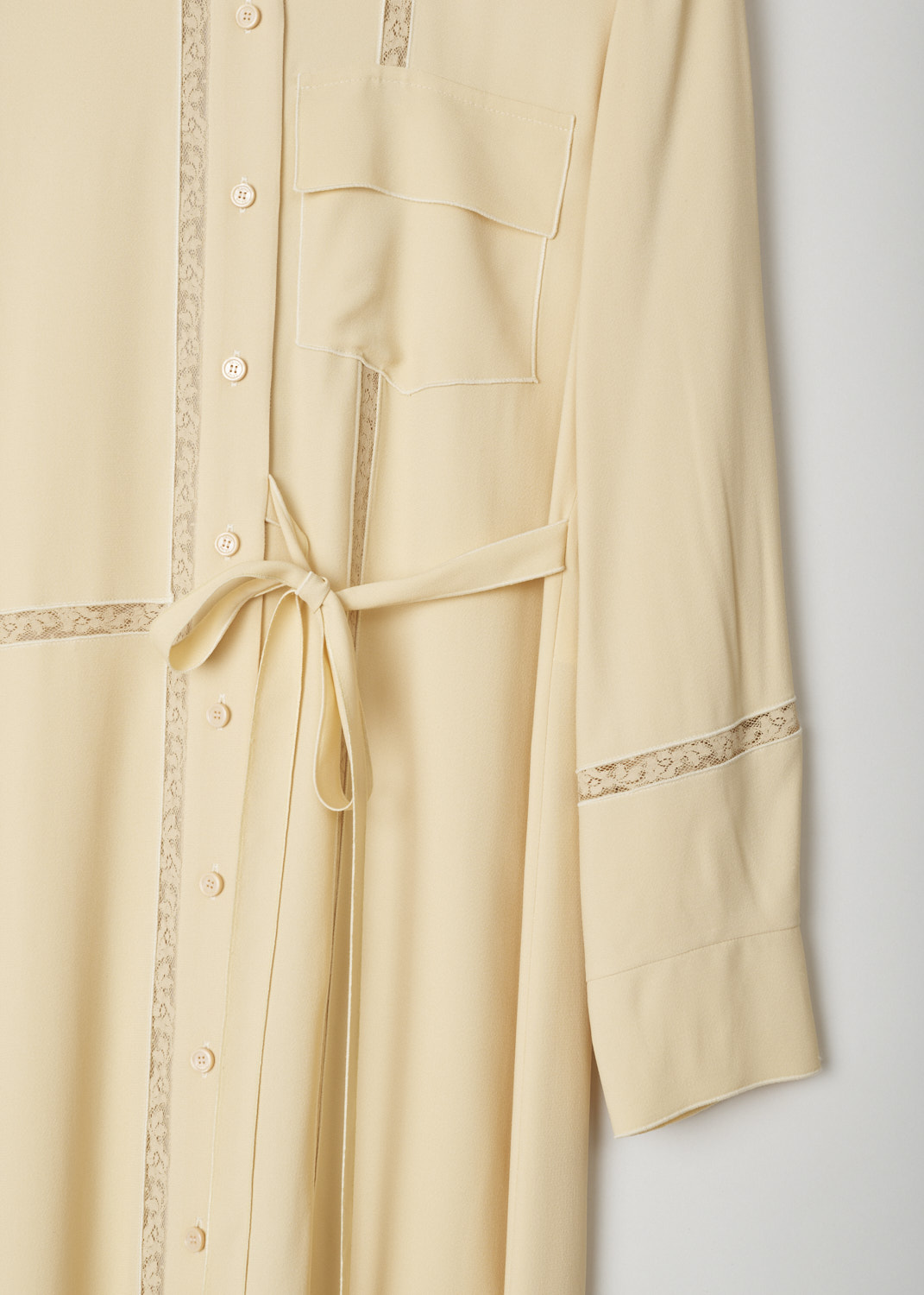 ChloÃ©, Nude coloured shirt dress with lace inlay, CHC21URO39030291_291_light_sand, beige, detail, A gorgeous shirt dress comes in this lovely apricot yellow, featuring a disco collar, long cuffed sleeves and has a ribbon on waist height to give this model a feminine silhouette. A noticeable feature of this model must be the lace inlay which just adds more excitement to this piece.