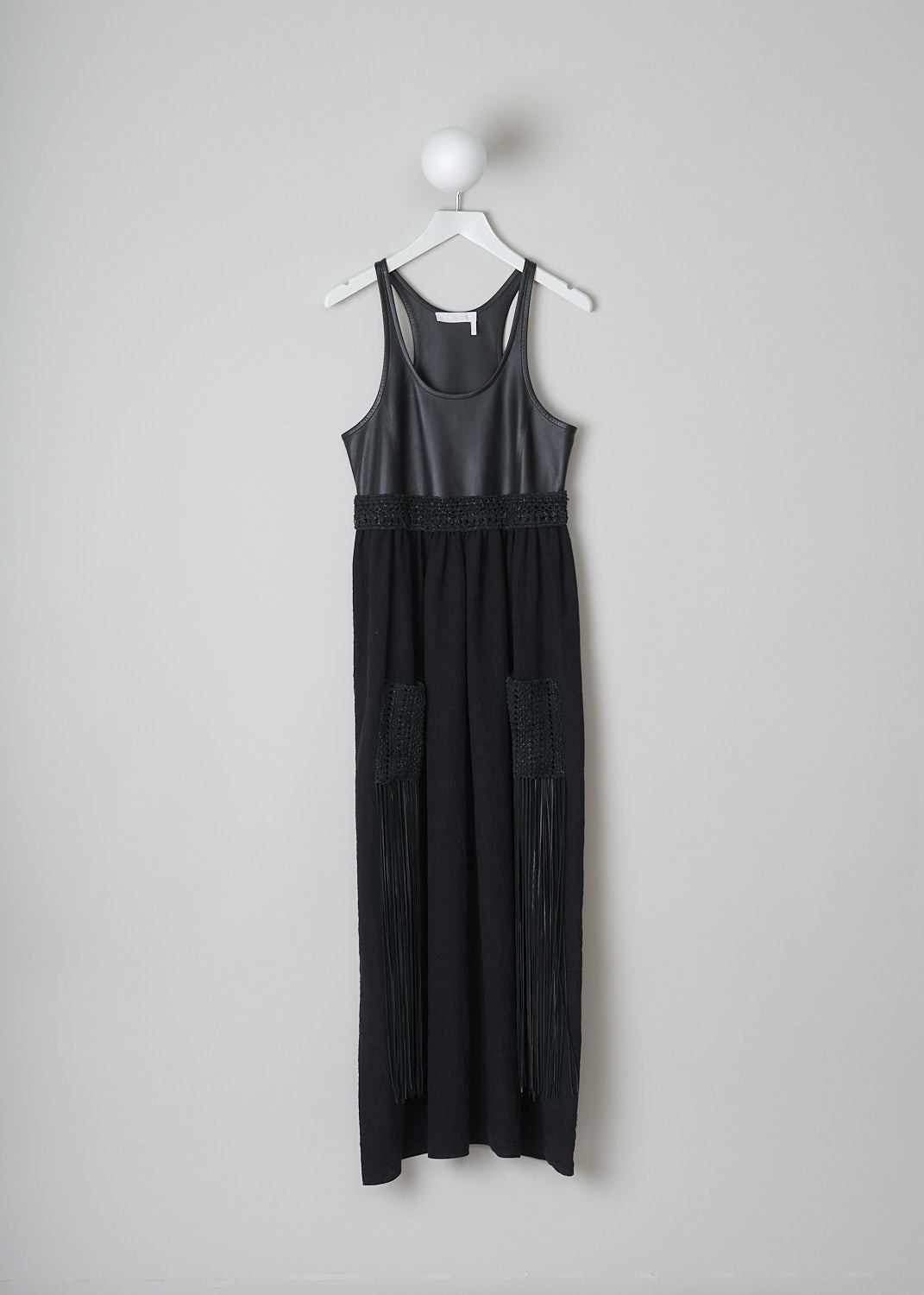 CHLOÃ‰, SLEEVELESS MULTI-FABRIC DRESS, CHC22SRO55035001_BLACK, Black, Front, This sleeveless midi dress has a black leather bodice with a U-neckline. A braided leather belt separates the bodice from the black linen maxi length skirt. On the skirt, two braided leather patch pockets with long fringes can be found. 

  
