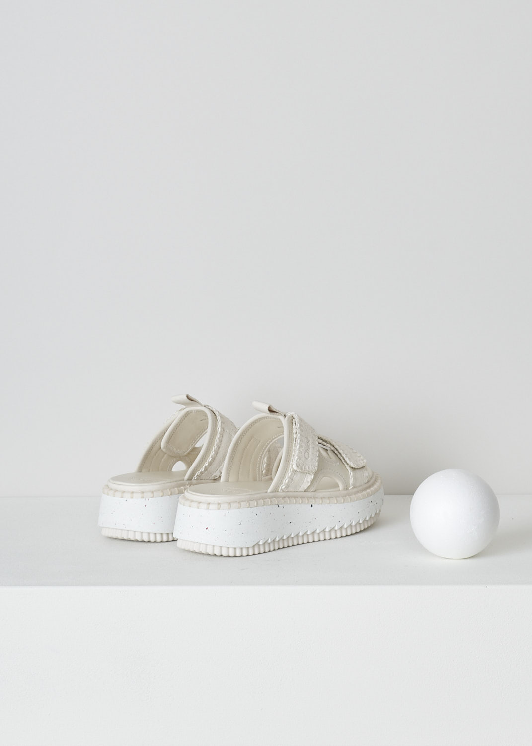 CHLOÃ‰, WHITE CHUNKY LILLI SLIDES, CHC22U626Z8101_LILLI, White, Back, These slides have a round open-toe and two adjustable Velcro straps across the vamp. The chunky white speckled soles have a serrated trim and blanket stitching at the welt. 
