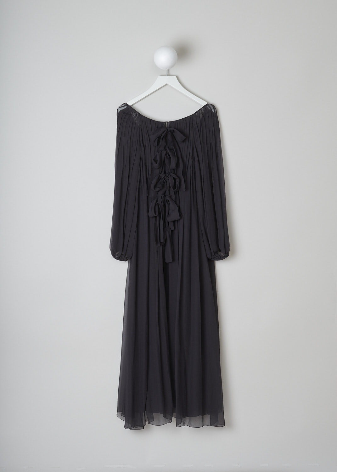 CHLOÃ‰ FLOWY ASH BLACK DRESS, CHC23SRO77101070_070, Black, Grey, Back, This ash black silk midi dress has a wide round neckline. The long semi sheer sleeves have gathered cuffs. The dress has a slip dress sewn in under the flowy sheer silk fabric. In the back, a hook-and-eye and four ties function as the closure. 
