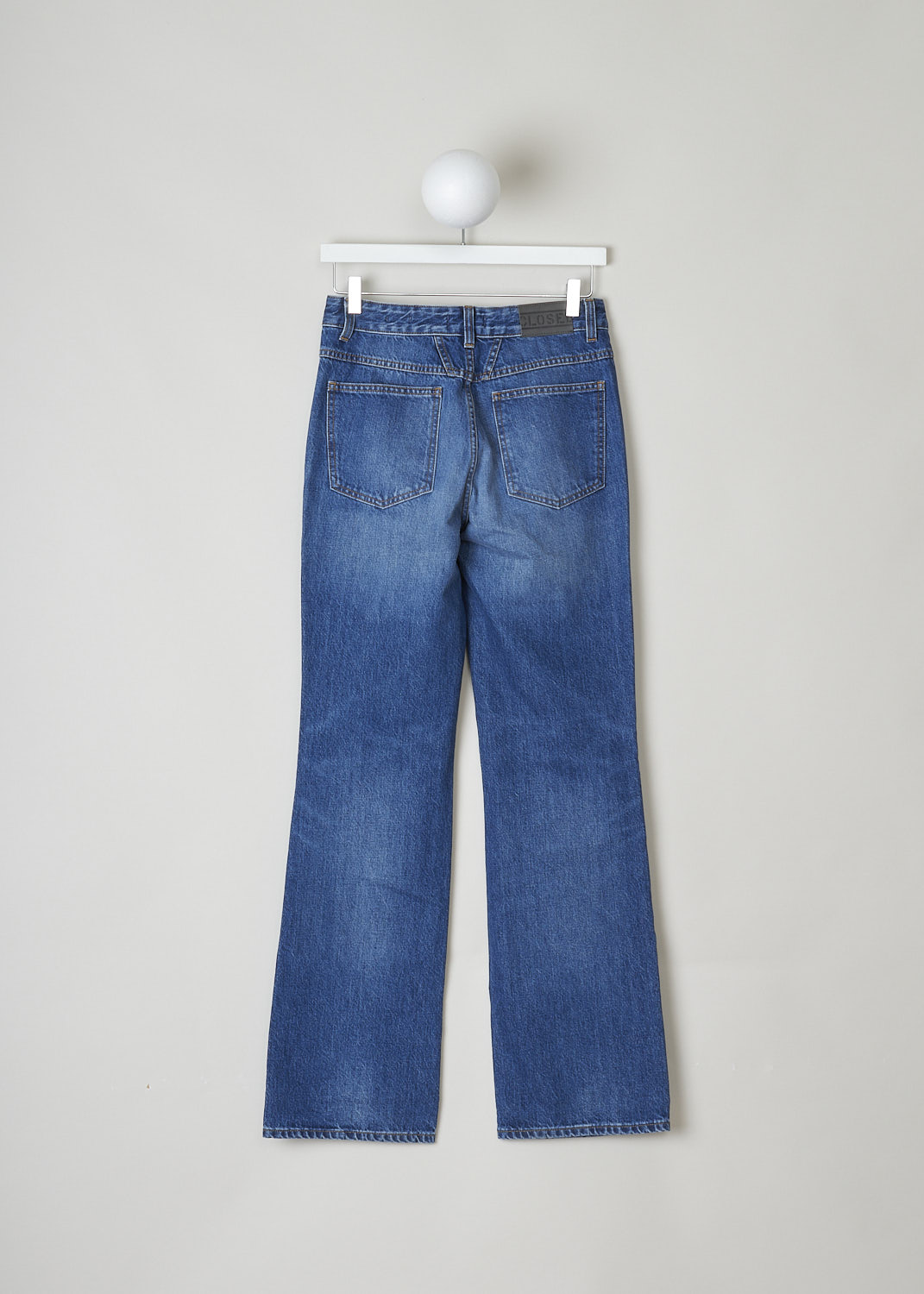 CLOSED, FLARED HIGH-WAIST JEANS IN A MID BLUE WASH, LEAF_C91301_15X_31_MBL, Blue, Back, These high-waisted jeans in a mid blue wash have a narrow waistband with belt loops. A button and zipper function as the closure option. These pants have a 5-pocket design, with two slanted pockets and a coin pocket in the front and two patch pockets in the back. These pants have flared pant legs. 
