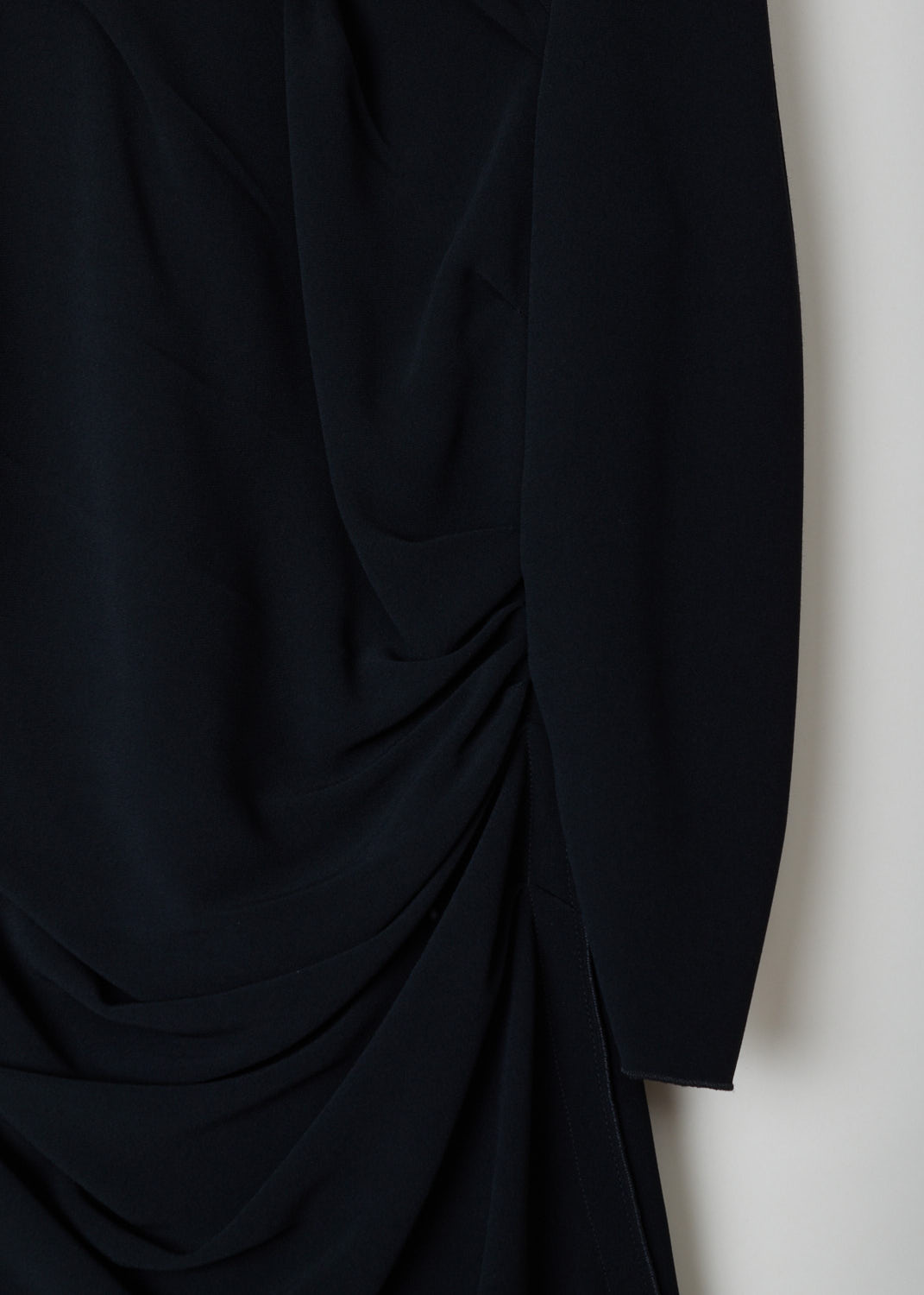 Dolce & Gabbana, Black mid-length dress with draped features, F6BQ0T_FSADD_X0873, black, detail2, Black draped dress featuring a round neckline, 3/4 sleeve length with a midi dress length. Pleats staring on the shoulder flow down the dress, with similar pleats starting on waist height.  