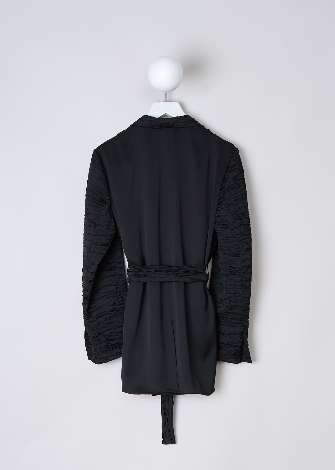 DRIES VAN NOTEN, BLACK RUCHED BOMEA JACKET, BOMEA_5263_WW_JACKET_BLA, Black, Back, This black Bomea jacket is made in a textured ruched fabric. The jacket has a peaked lapel and an open front with a matching fabric belt to cinch in the waist. The long sleeves have cuffs with a small slit. The jacket has a straight hemline. The back is made in a smooth satin fabric with a centre vent.  
