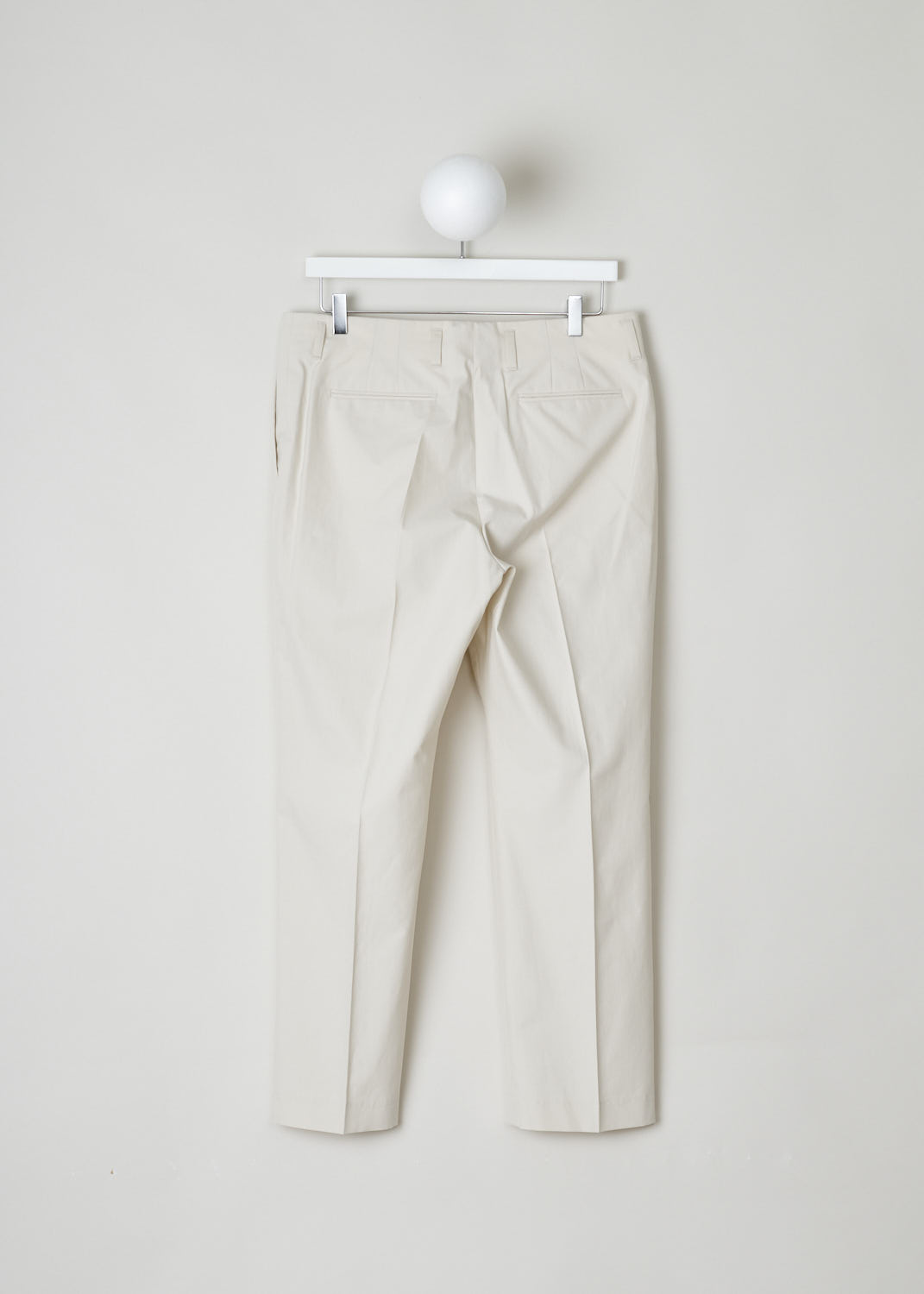 DRIES VAN NOTEN,ECRU PANTS WITH FRONT PLEATS, PAOLA_9022_WW_PANTS_ECR, Beige Back, These ecru trousers don's have an obvious waistband. Across the waist, belt loops can be found. It comes with a zip and clasp closure. Additionally these trousers have two side slit pockets in the front and two welt pockets in the back. 
