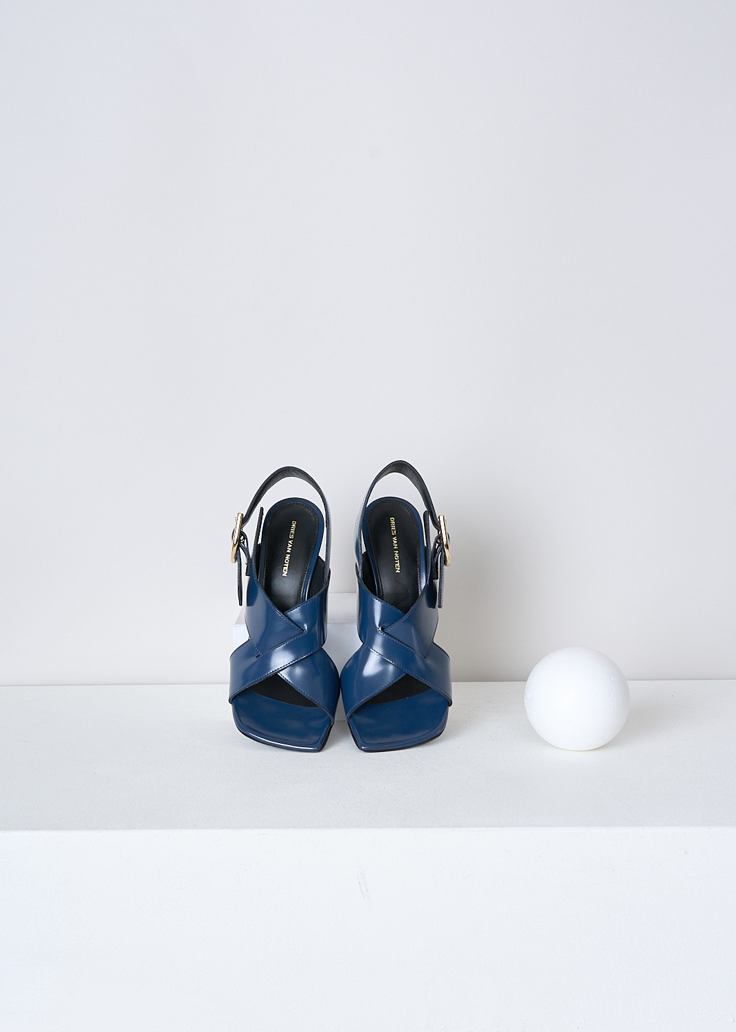 DRIES VAN NOTEN, BLUE OPEN-TOE SANDALS WITH HEEL, WS231_668_QU104_BLUE504, Blue, Top, These blue slingback pumps have an adjustable ankle strap with a gold-tone buckle. These pumps have a crisscross-strap across the vamp with a squared open toe. These pumps have a blocked heel.
