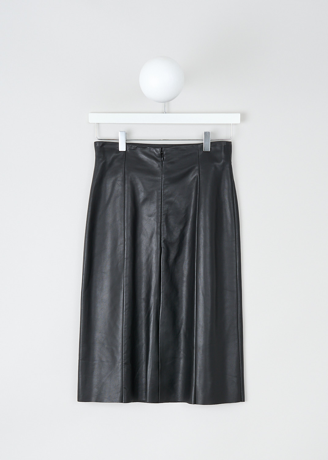 Drome, Black leather midi skirt, DPD1862VP_D1098P_800_BLACK, Black, Back, This black leather midi skirt has a slight A-line silhouette. The skirt has a concealed centre zip in the back. Vertical seam give the skirt a paneled look. The skirt has a straight hemline with a centre vent in the back. The skirt is fully lined.
