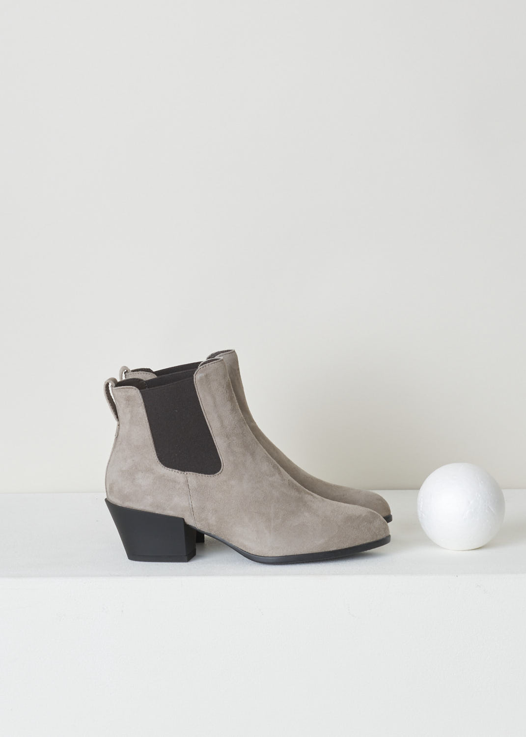 HOGAN, BEIGE SUEDE CHELSEA BOOTS, HXW4010W890CR0C407, Beige, Grey, Side, Beige suede Chelsea boots featuring a contrasting black elastic side panel and a pull tab on the back of the boot. These boots have a small heel and a pointed toe.  

Heel height: 5.5 cm / 2.1 inch
