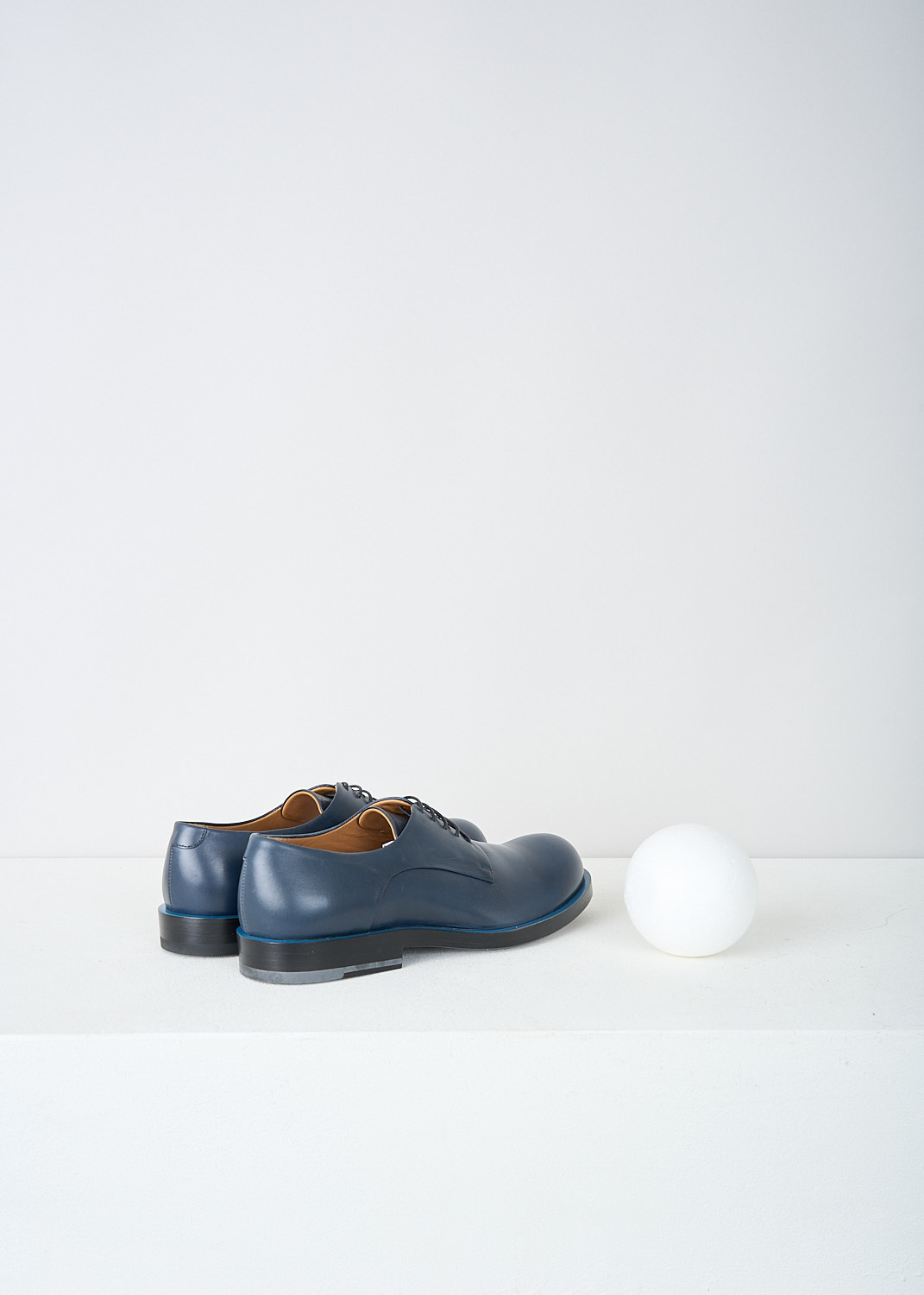 Jil Sander, Petrol blue derby shoes, JS22052_746_NOTTE_BLUE, Blue, Back, These petrol blue leather derby shoes have a classic lace-up closing. The top peeking out of the otherwise black soles creates a  light blue trim along the shoes. 
