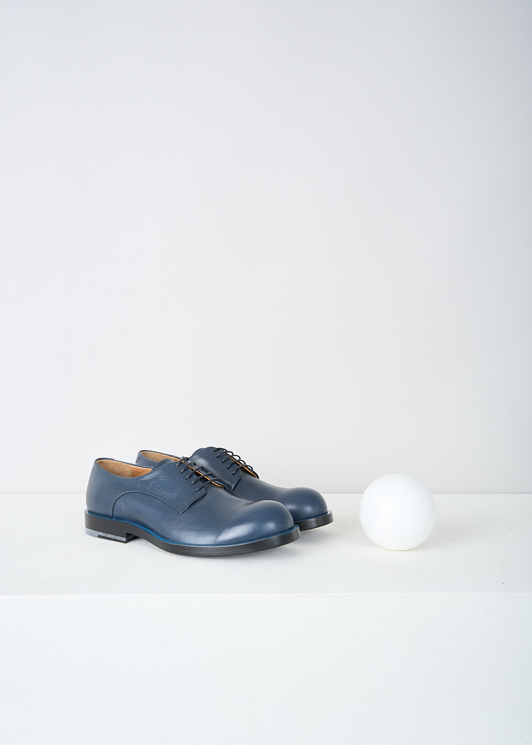 Jil Sander, Petrol blue derby shoes, JS22052_746_NOTTE_BLUE, Blue, Front, These petrol blue leather derby shoes have a classic lace-up closing. The top peeking out of the otherwise black soles creates a  light blue trim along the shoes. 
