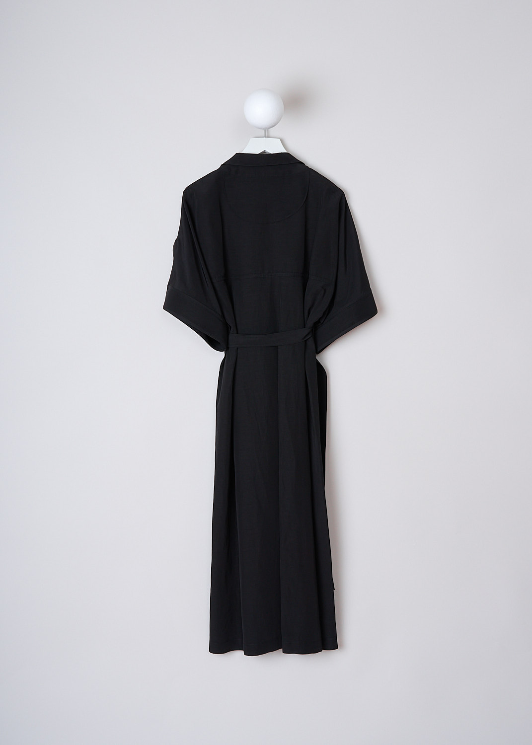 JIL SANDER BLACK GALATEA WRAP DRESS, JSWO509255_W0390500D_001, Black, Back, This black midi wrap dress with three-quarter length sleeves with oversized buttoned cuffs. The dress has a cutaway-collar and a V-neckline. To on side, a single slanted pockets is concealed in the side seam. On the other side, the dress has a side slit. The dress features an inner attached slip dress. The dress has a straight hemline.
 
