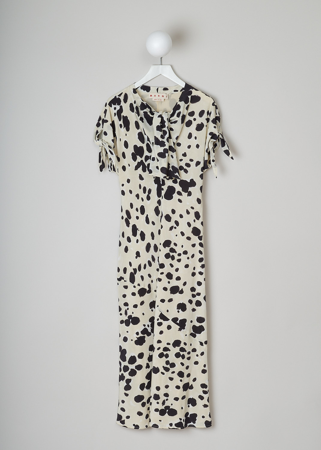 MARNI, POP DOTS SILK CRÊPE MAXI DRESS, ABMA0871U0_UTSF85_PDW13, White, Beige, Print, Front, This ivory silk crêpe maxi dress has an all-over pop dots print. The dress has a bow-tie neckline with a deep V. The short sleeves have tie cuffs. The long skirt flares out at the bottom. Zigzag stitching runs along the side seams and hem. The dress is fully lined.  
