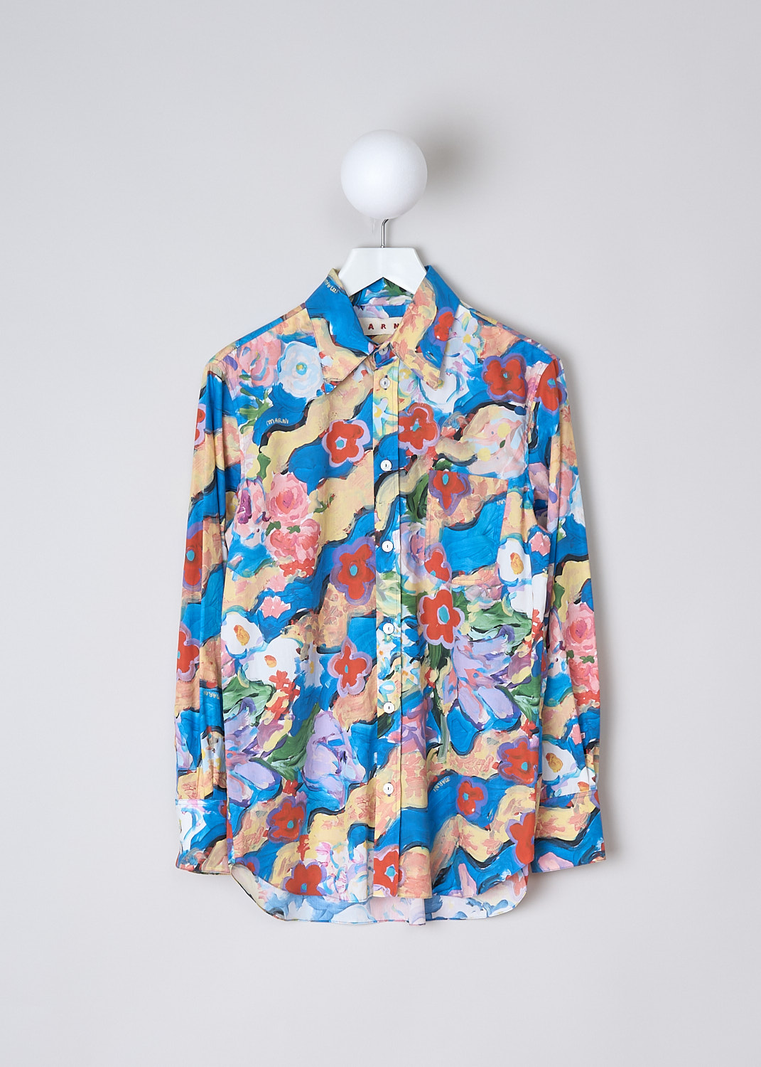 MARNI, COBALT JULIE POPLIN BLOUSE, CAMA0103A1_UTC229_JUB44, Blue, Print, Pink, Front, This Cobalt Julie poplin blouse has a multicolor all-over floral print. The blouse has a spread collar and a front button closure with mother-of-pearl buttons. The blouse has a single breast pocket. The long sleeves have buttoned cuffs. The rounded hem has a high-low hem, with the back being slightly longer than the front. 
