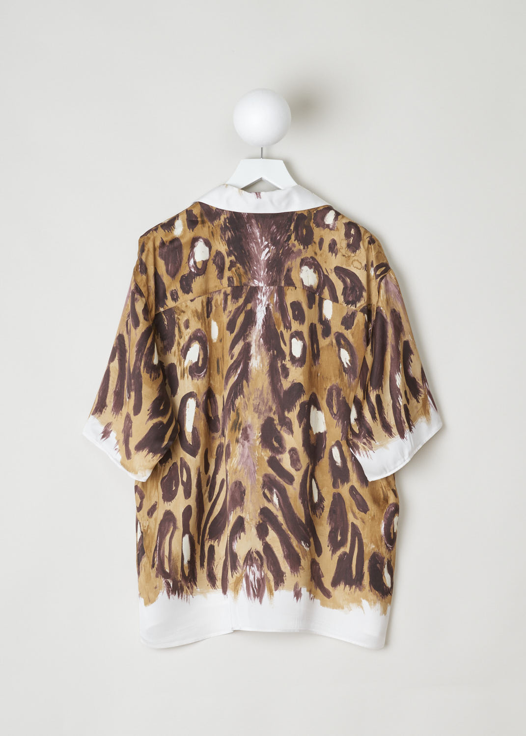 MARNI, ANIMAL PRINT BLOUSE WITH SHORT SLEEVES, CAMA0501A0_UTV912_WBM20, Brown, Print, Back, This loose fitting short sleeved blouse is made in a satin animal print. This blouse features a classic collar, a single breast pocket and front button fastening. This model has an asymmetrical finish, meaning the back is a little longer than the front.
