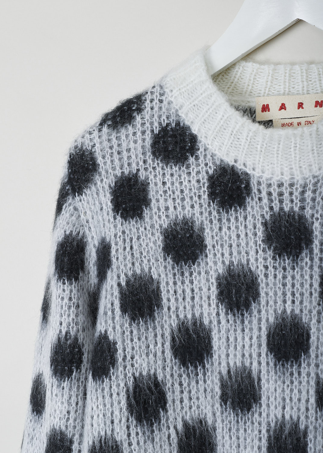 MARNI, BRUSHED DOTS FUZZY WUZZY SWEATER, GCMMD0476Q0_UFU160_DOW0, Grey, Print, Black, Detail, This brushed dots Fuzzy Wuzzy crew neck sweater has a white neckline with a ribbed finish. That same white ribbed finish can be found on the cuffs and hemline. The sweater has a two-tone dot pattern in grey and black.
