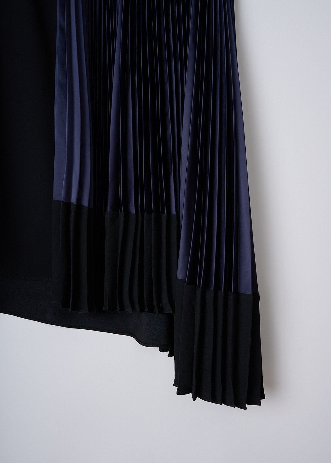 MARNI, LIGHT NAVY AND BLACK SATIN PLEATED SKIRT, GOMA0129FQ_TV710_Y5704, Black, Blue, Detail, This A-line multi-fabric midi skirt is made with a sleek black fabric  with a pleated light navy satin insert to one side. A concealed zip in the back functions as the closure. The skirt has an asymmetric hemline. 
