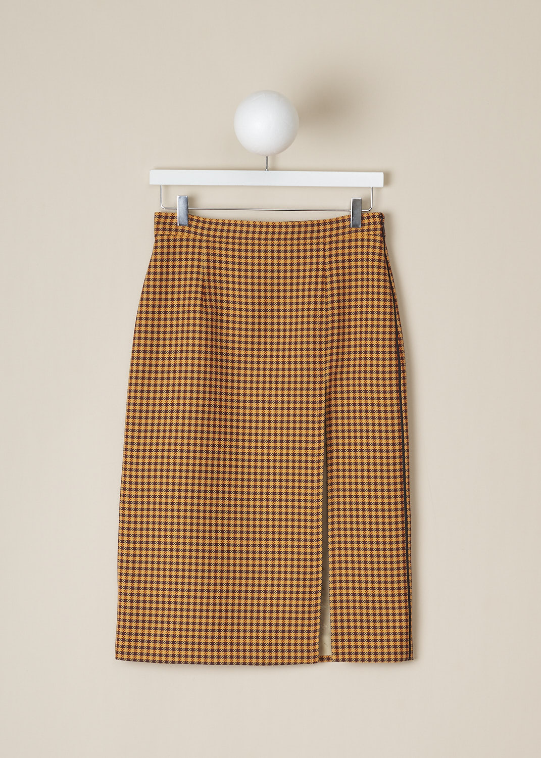 MARNI, ORANGE HOUNDSTOOTH MIDI SKIRT, 
GOMA0554IU_UTP730_CHR79, Orange, Print, Front, This high-waisted orange Houndstooth midi skirt has a narrow waistband and a concealed side zip that functions as the closure option. Black piping runs along the side seams. In the front, the skirt has a high slit. The skirt has a straight hemline. 
