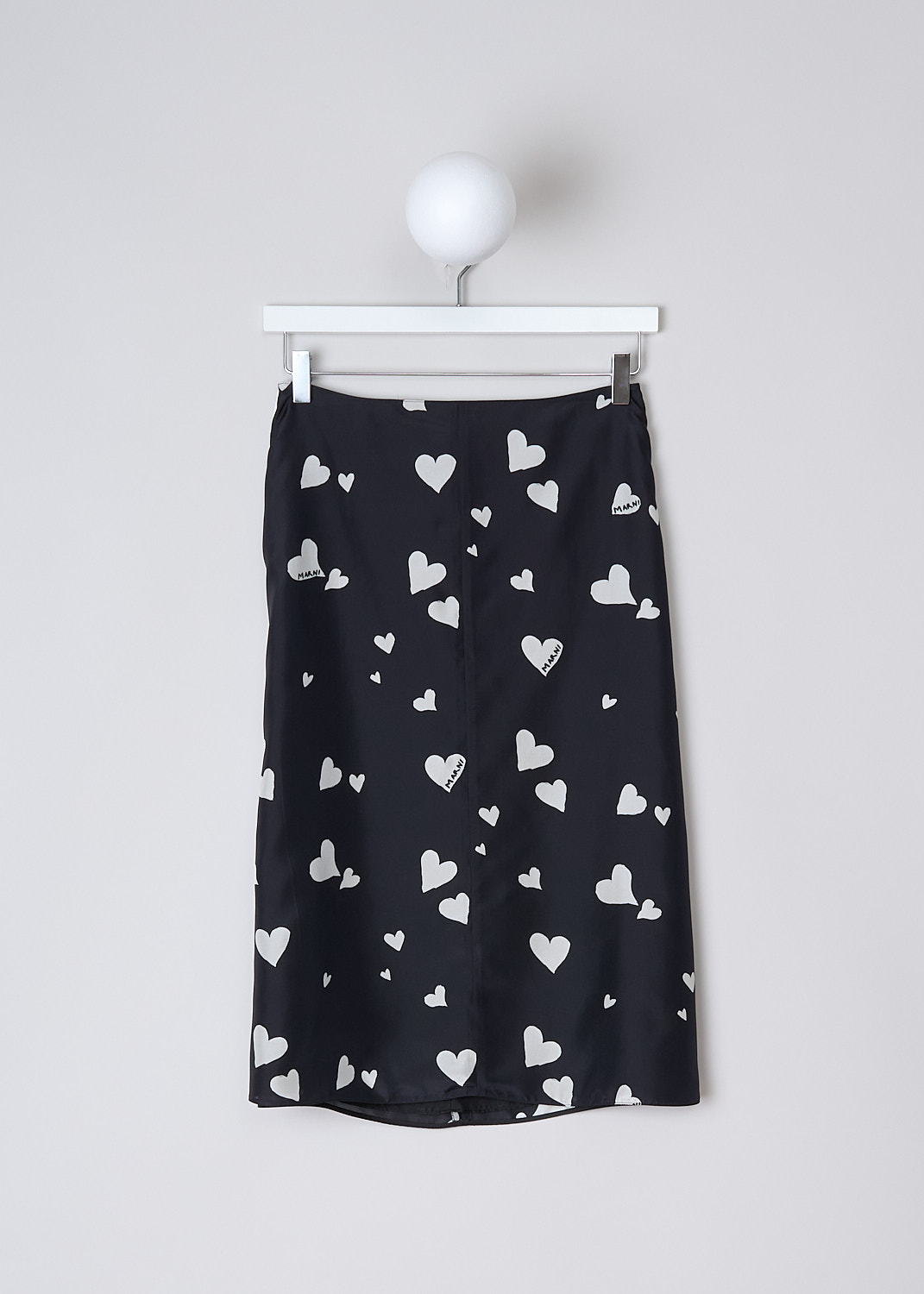 MARNI, BUNCH OF HEARTS SILK SKIRT, GOMA0580I0_UTSG03_BHN99, Black, White, Print, Front, This Bunch of Hearts silk midi skirt has a black base color with a white heart print. White piping runs along the side seams. The skirt has an A-line silhouette with a straight hemline. In the back, a concealed centre zip functions as the closure. The skirt is fully lined. 
