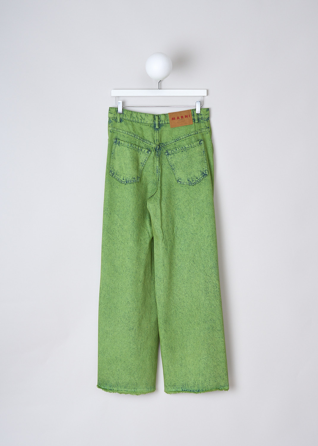 MARNI, MARBLE-DYED BLEACHED DENIM PANTS IN KIWI, PAJD0340A0_USCV96_MBV40, Green, Back, These marble-dyed bleached denim pants in Kiwi have a waistband with belt loops and a button and zip closure. These pants have a 5-pocket design, with two slanted pockets and a coin pocket in the front and two patch pockets in the back. The pants are high-waisted with wide pant legs. The hem is frayed.

