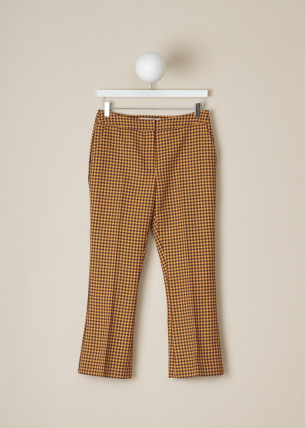 MARNI, ORANGE HOUNDSTOOTH PANTS, PAMA0341IM_UTP730_CHR79, Orange, Print, Front, These mid-rise orange Houndstooth pants has a narrow waistband and a concealed clasp and zip closure. These pants have slanted pockets in the front and welt pockets in the back. Black piping runs along the side seams and centre creases run along the length of the pant legs. 
