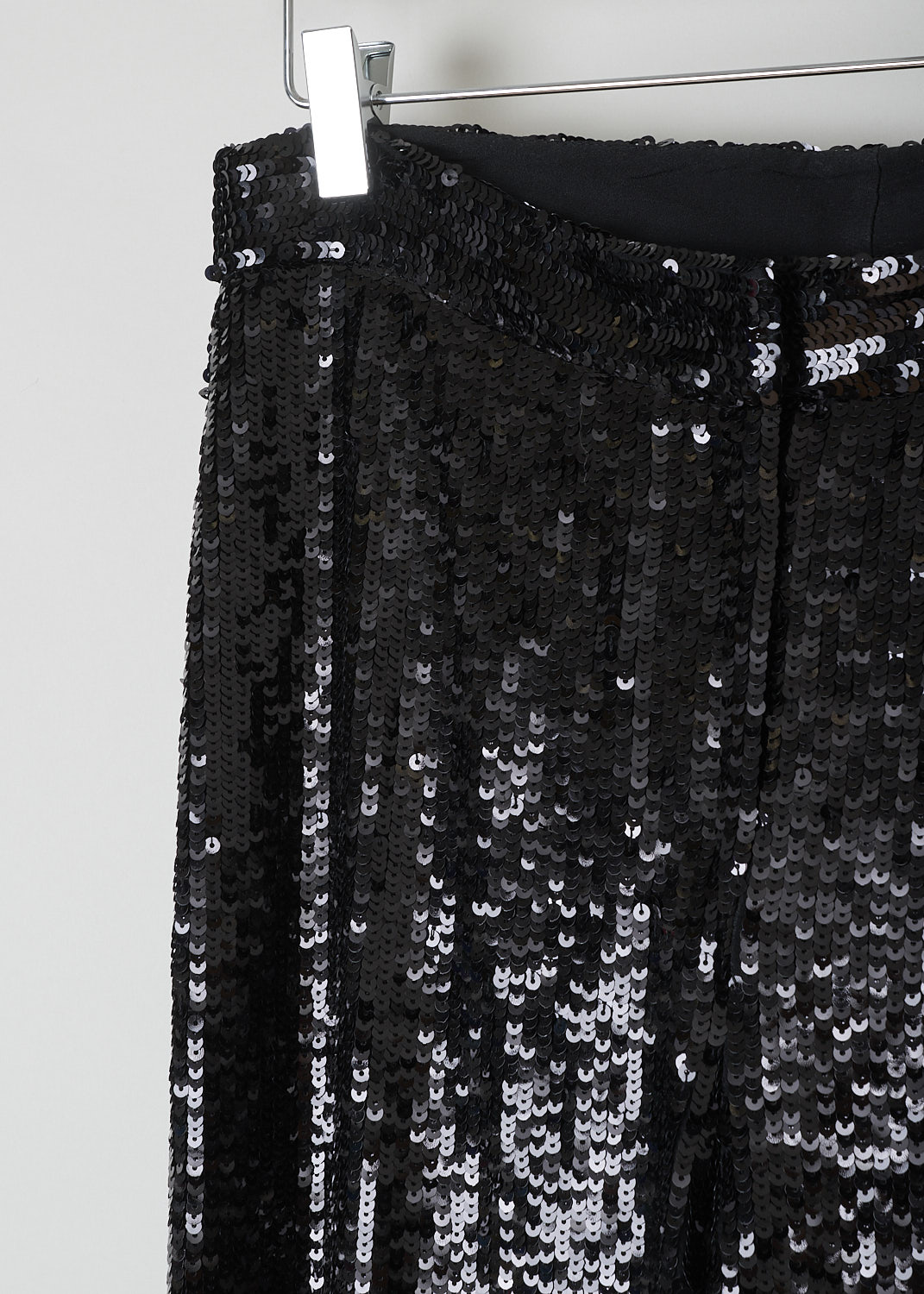 NILI LOTAN, BLACK SEQUIN PANTS, 12186_W688_BLACK, Black, Detail, These black pants are fully covered with see-through sequin. A concealed clasp and zip functions as the closure option. These pants have straight pant legs and are fully lined. 
