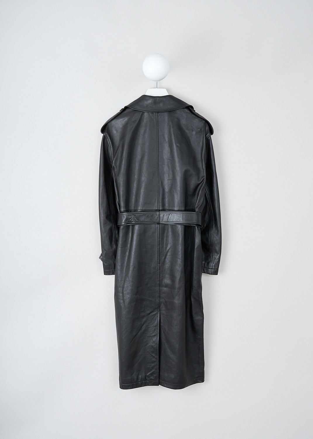 Nili Lotan, Peter oversized leather trench, PETER_OVERSIZED_LEATHER_TRENCH_12369_L115_BLK, Black, Back, This Peter oversized leather trench has a notched lapel and a double-breasted front button closure. The coat has epaulettes on the shoulders. The long sleeves have cuff straps. The coat has a belted waist, slanted pockets and a single inner pocket.
