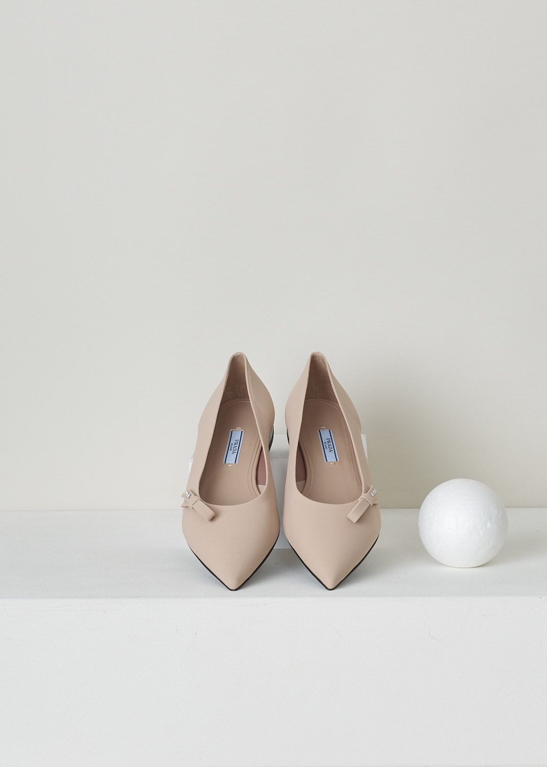 PRADA, NUDE BALLET FLATS WITH POINTED TOE, TESSUTO_TECH_1F273L_3KQ6_F0A48_NUDO, Pink, Beige, Top, These nude colored ballet flats have a pointed toe with, along the topline, a bow with the brand's name in silver-toned letters. These slip-in flats have a small heel. 
