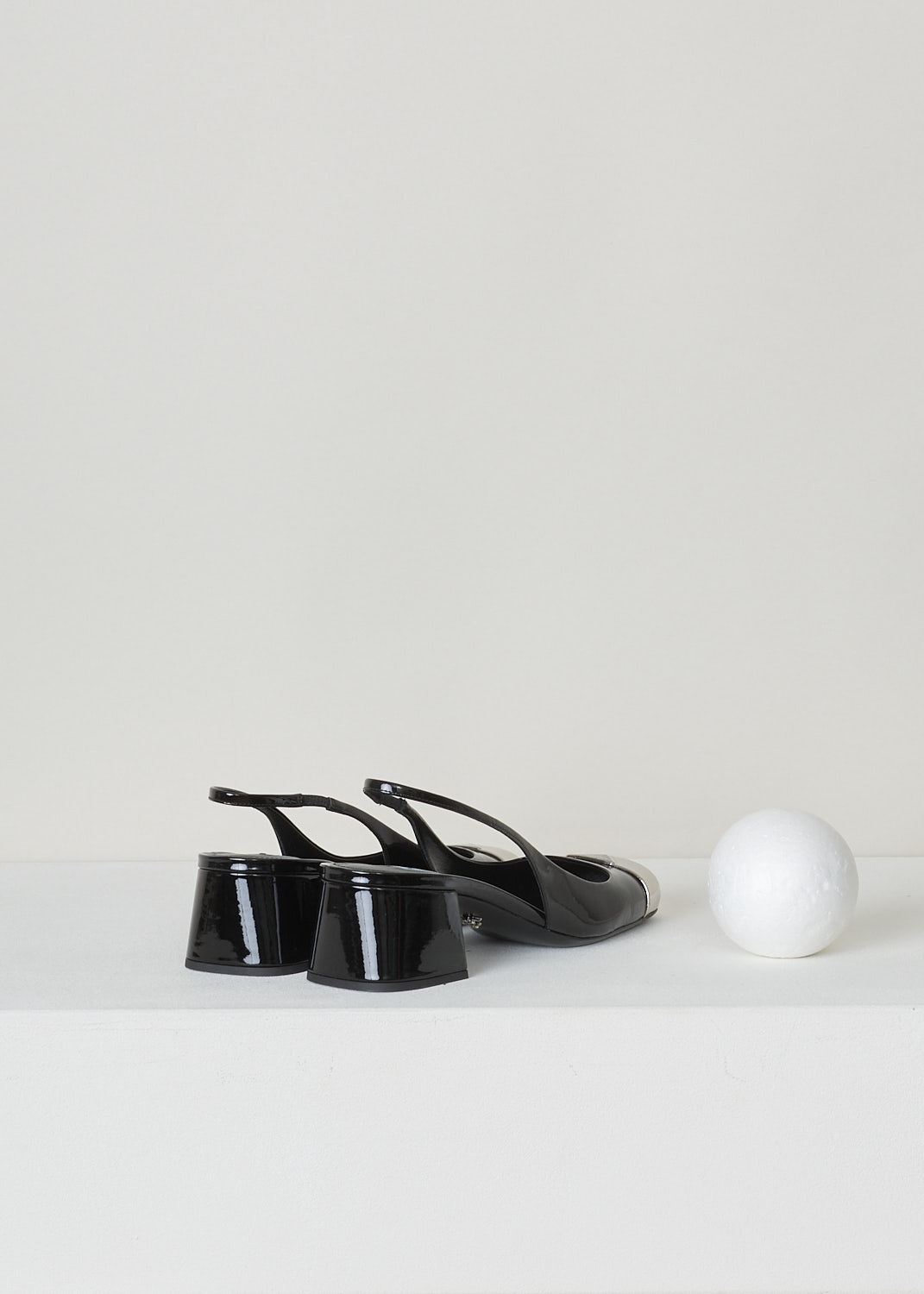 Black slingback heels with silver toe at Kiki's Stocksale