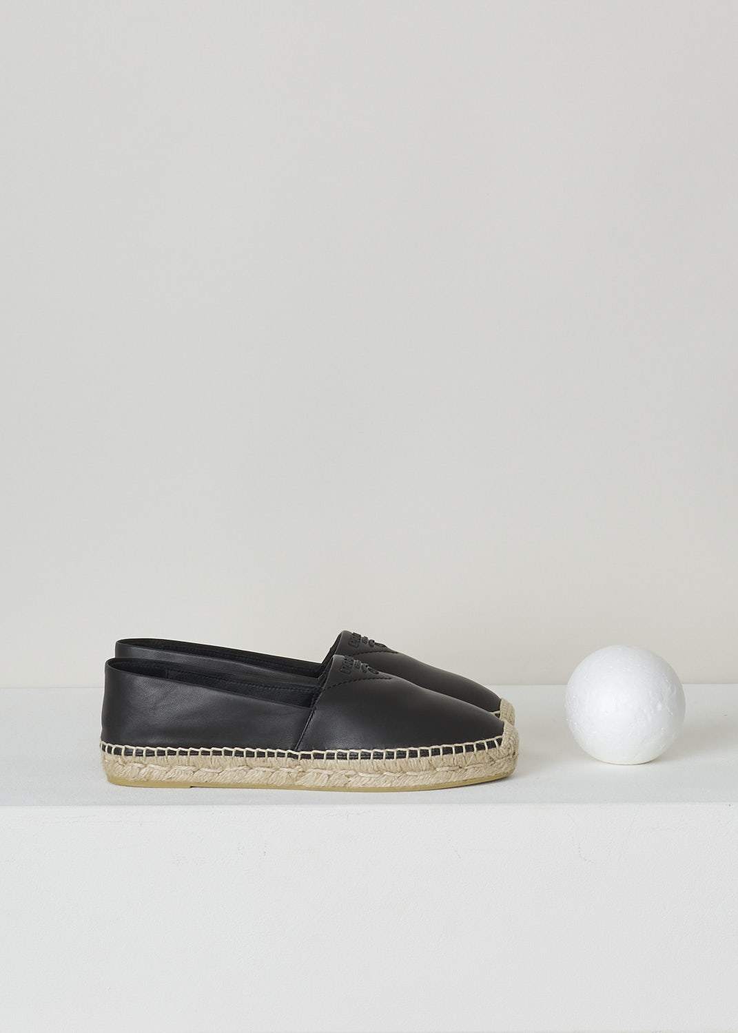 PRADA, BLACK LEATHER ESPADRILLES, NAPPA_1_1S871M_79N_F0002_NERO, Black, Side, These black, soft leather Espadrilles have a round toe that goes over into the braided jute soles. The brand's triangle logo can be found on the vamp.

