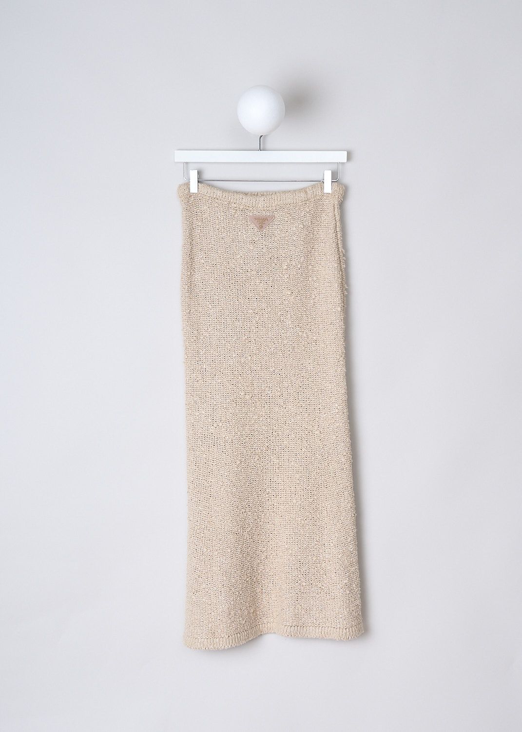 PRADA, SILK BOUCLÉ MAXI SKIRT IN NATURAL, 21427_12ZD_F0018_NATURALE, Beige, Back, This silk bouclé maxi skirt in Natural has an elasticated waistband with a brown leather drawstring. The skirt flares out slightly. In the back, the brand's triangle logo patch can be found.  
