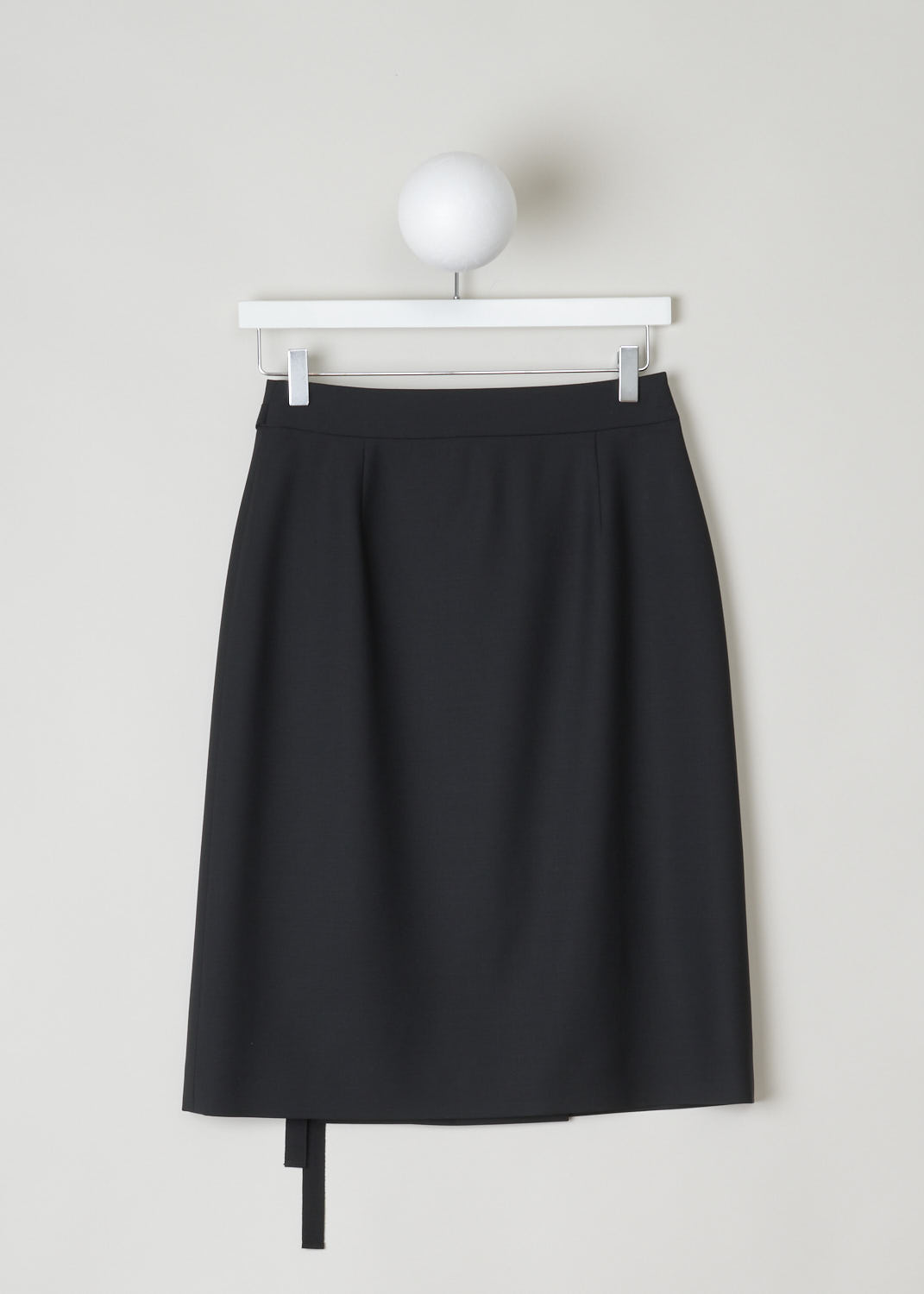 PRADA, BLACK WRAP SKIRT WITH BUTTONS AND TIE DETAIL, 
KID_MOHAIR_P122R_NERO, Black, Back, Black wrap skirt with three contrasting mother-of-pearl buttons on the side. Above the buttons, a black ribbon tie detail can be found. Both the buttons and the tie function as the closure option, as well as a concealed button and hook on the inside. 
