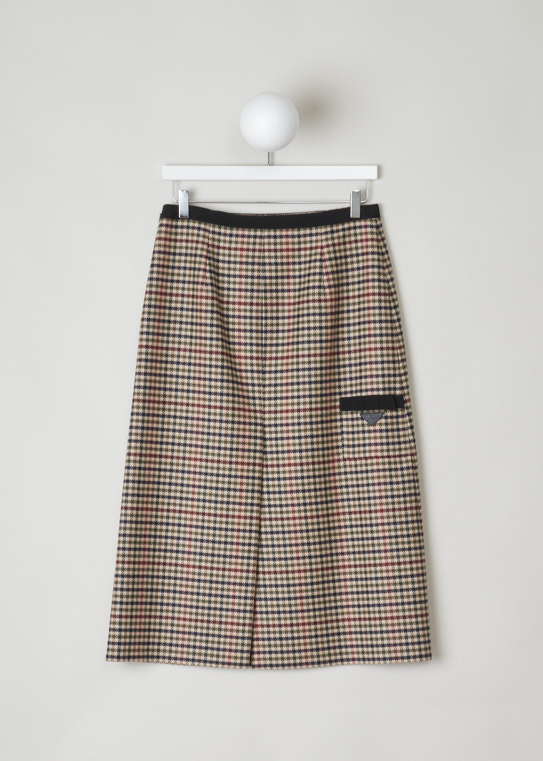 PRADA, CHECKED A-LINE MIDI SKIRT, PANNO_FANTASIA_P184R_1XF9_BLEU, Red, Brown, Print, Back, Beautiful argyle midi skirt in browns and reds. This A-line skirt has a contrasting black trim along the waist. That same trim can be found in the back, decorating the patch pocket. Also on the patch pocket, a triangle Prada logo can be found in leather. This skirt has a concealed zipper closure in the side seam. In the back, a centre slit can be found.