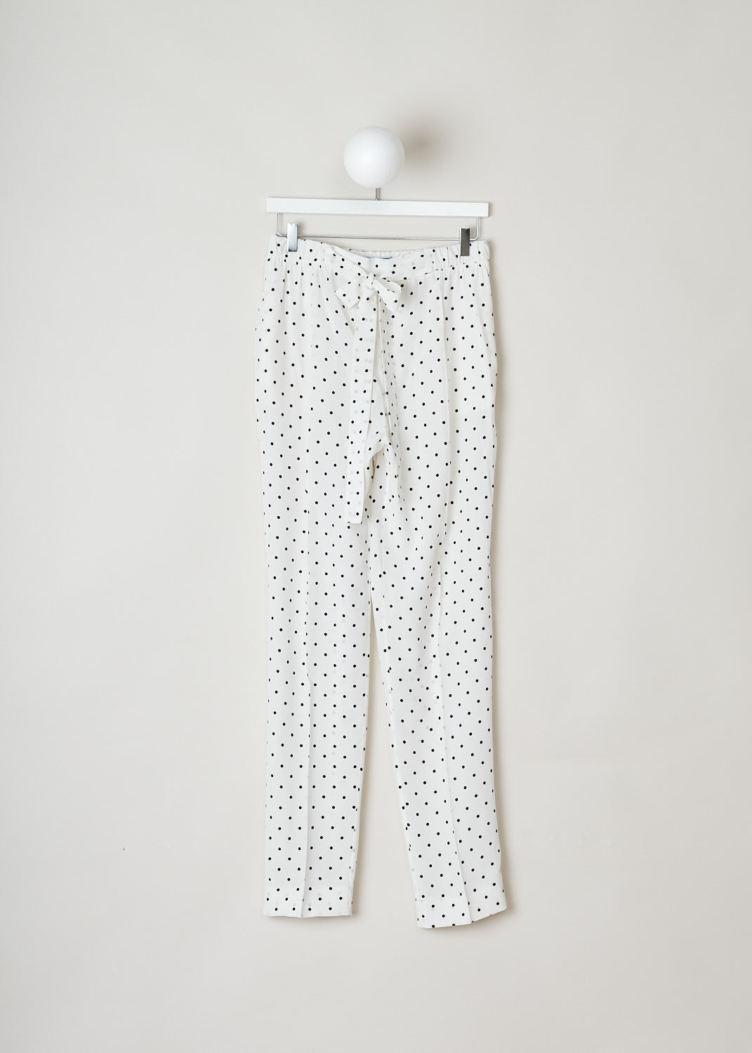 PRADA, WHITE SILK POLKA-DOT PRINT PANTS, CDC_POIS_P225EL_AVORIO_NERO, White, Print, Front, This fun polka-dot print pants comes with a belted waist. The fabric could be described as semi see through.  A concealed zipper closure can be found along the seam. The pants has slanted pockets on each side. 