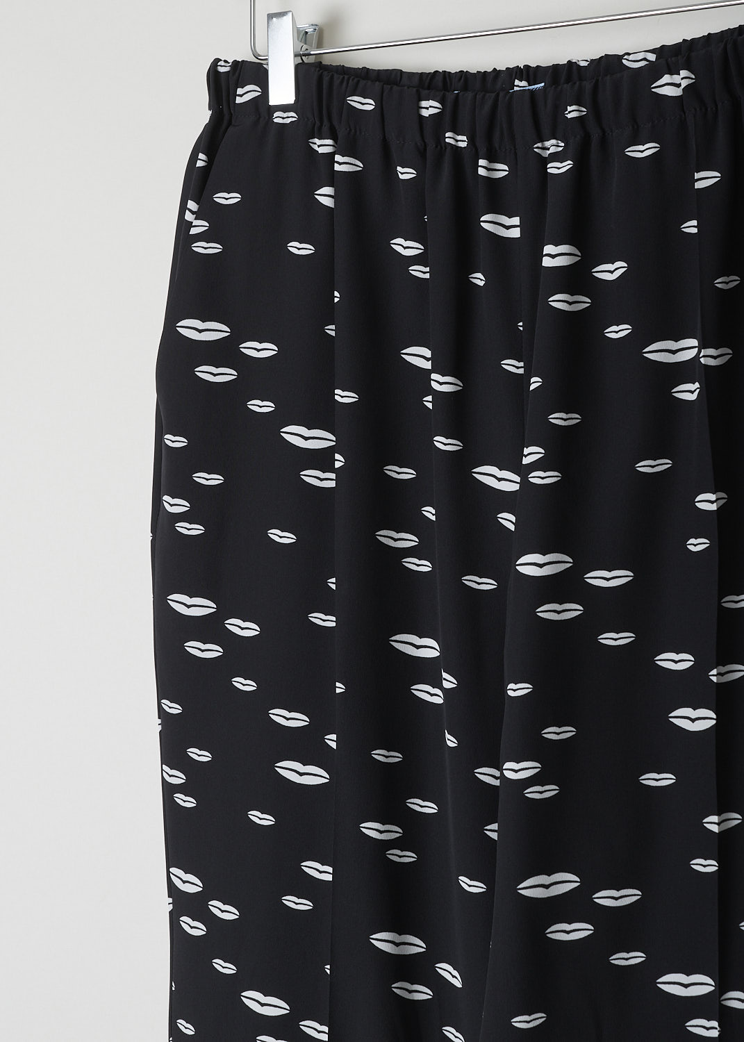 Black silk pants with white lip print at Kiki's Stocksale
