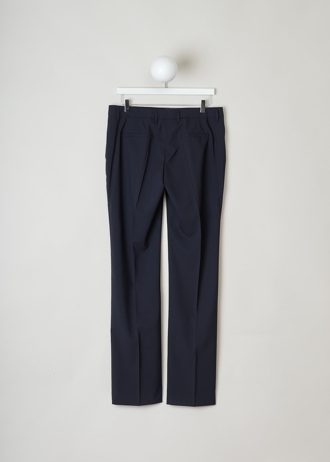 Prada, Classic navy blue pants, LANA_LEGGERA_P296B_BLUE, Blue, Back, These classic navy blue pants have a concealed zip and double clasp closure. The pant legs have pressed creases. These pants have forward slanted pockets in the front and welt pockets in the back.
