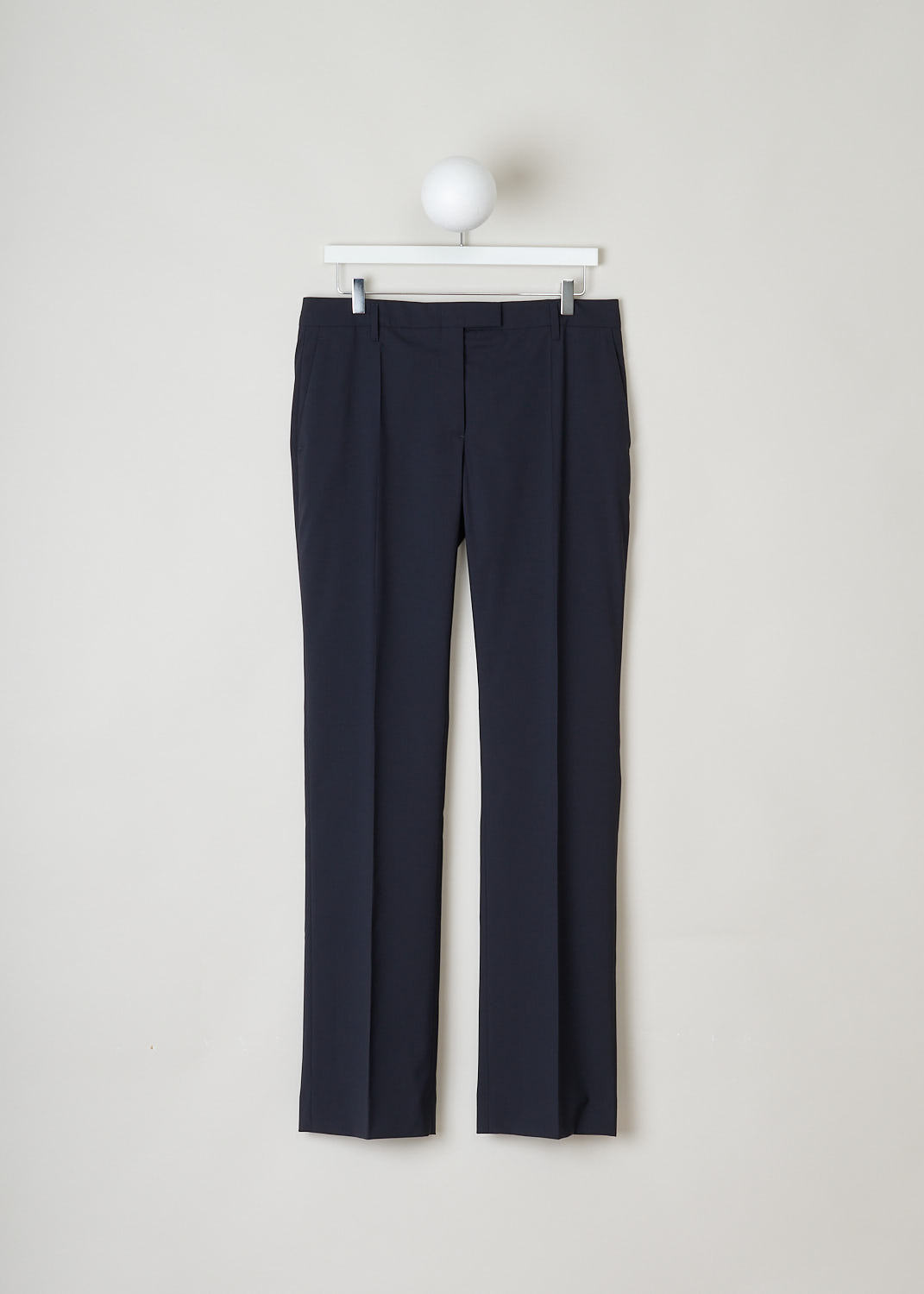 Prada, Classic navy blue pants, LANA_LEGGERA_P296B_BLUE, Blue, Front, These classic navy blue pants have a concealed zip and double clasp closure. The pant legs have pressed creases. These pants have forward slanted pockets in the front and welt pockets in the back.
