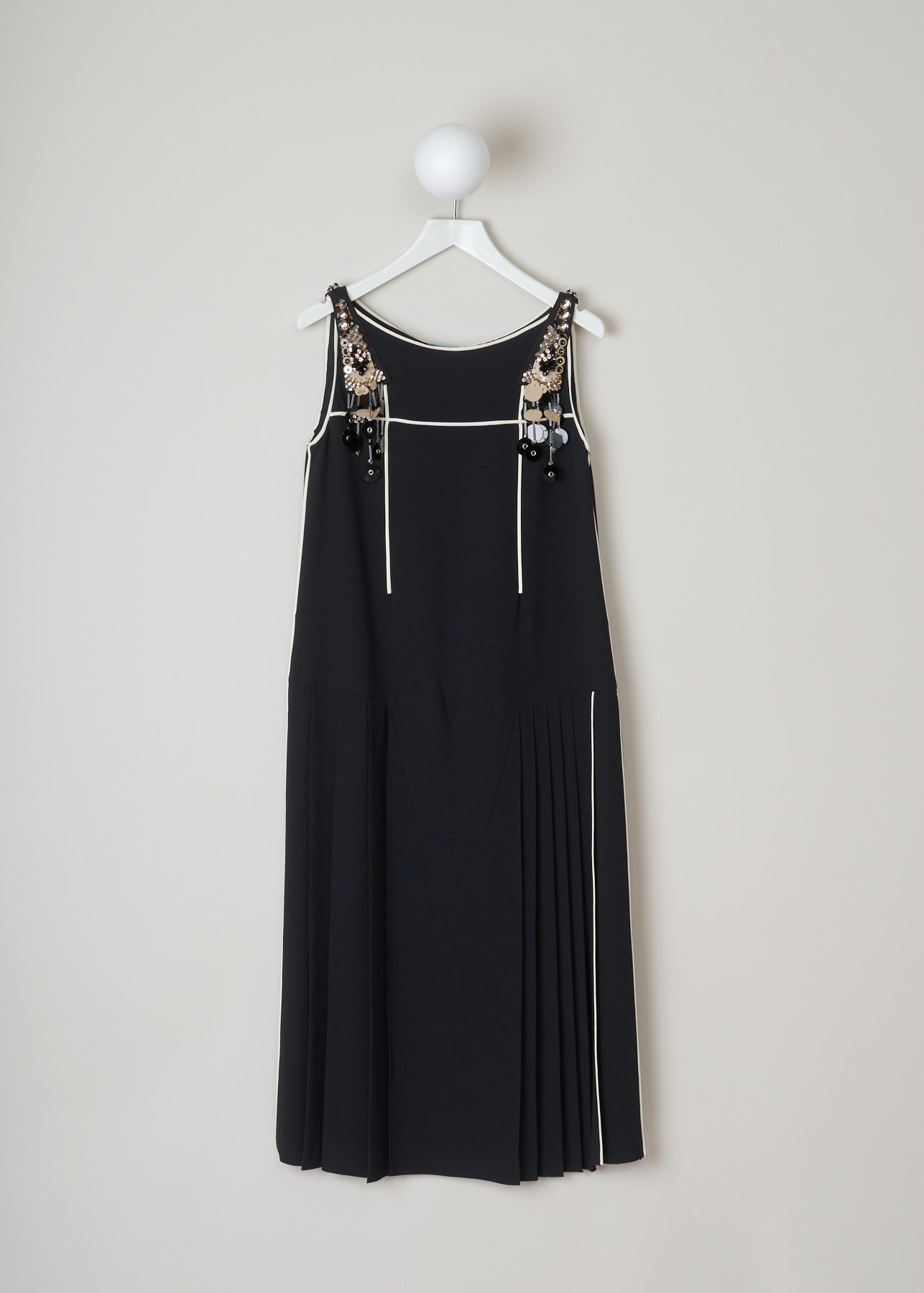 Prada, black beaded and sequined dress, SablePipingR_P33F7R_F0SJ2_NeroAvorioGRI, black, front, black dress trimmed in white. beautiful beads,crystals and sequins on the shoulder. concealed zipper on the left side of the dress. pleated skirt which flares out. 