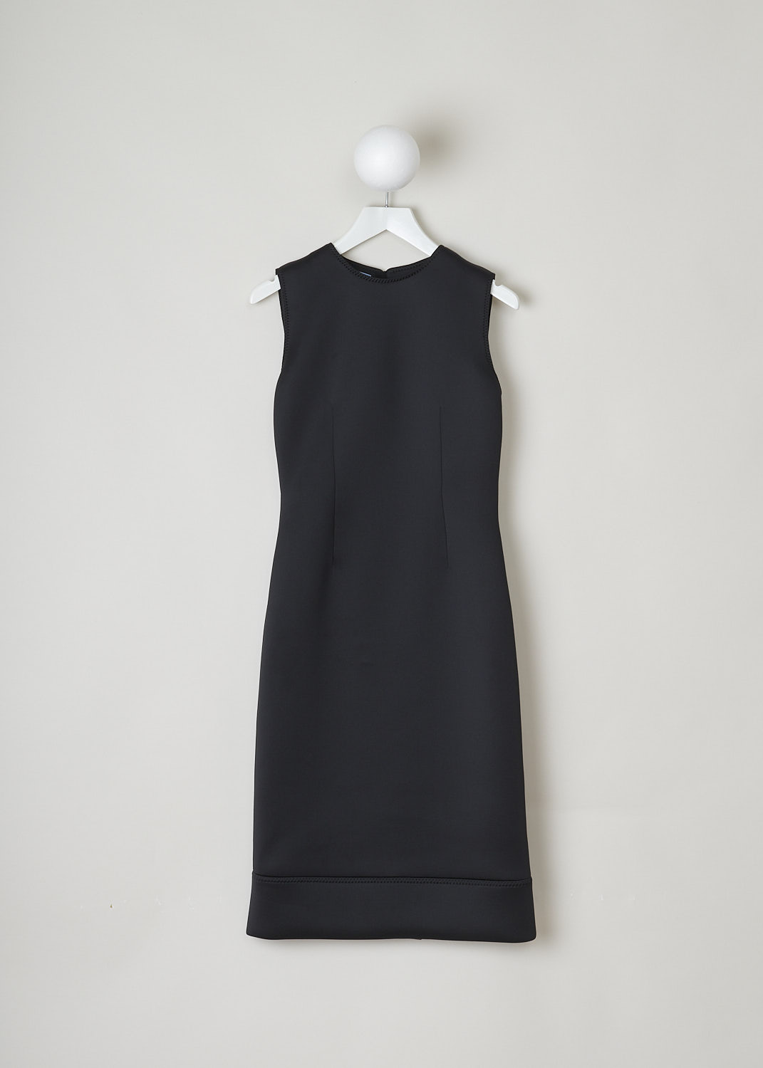 PRADA, BLACK SLEEVELESS SHEATH DRESS, P37H7_1SLI_F0002_JERSEY_DOPPIO_I_NERO, Black, Front, This black sleeveless sheath dress is made of a thick, neoprene-like fabric. This smooth, elasticated fabric hugs the body and is known not to wrinkles. The seams throughout the dress have a decorative zigzag pattern. The dress has a broad hemline. In the back, a concealed centre zip functions as the closure option. 
