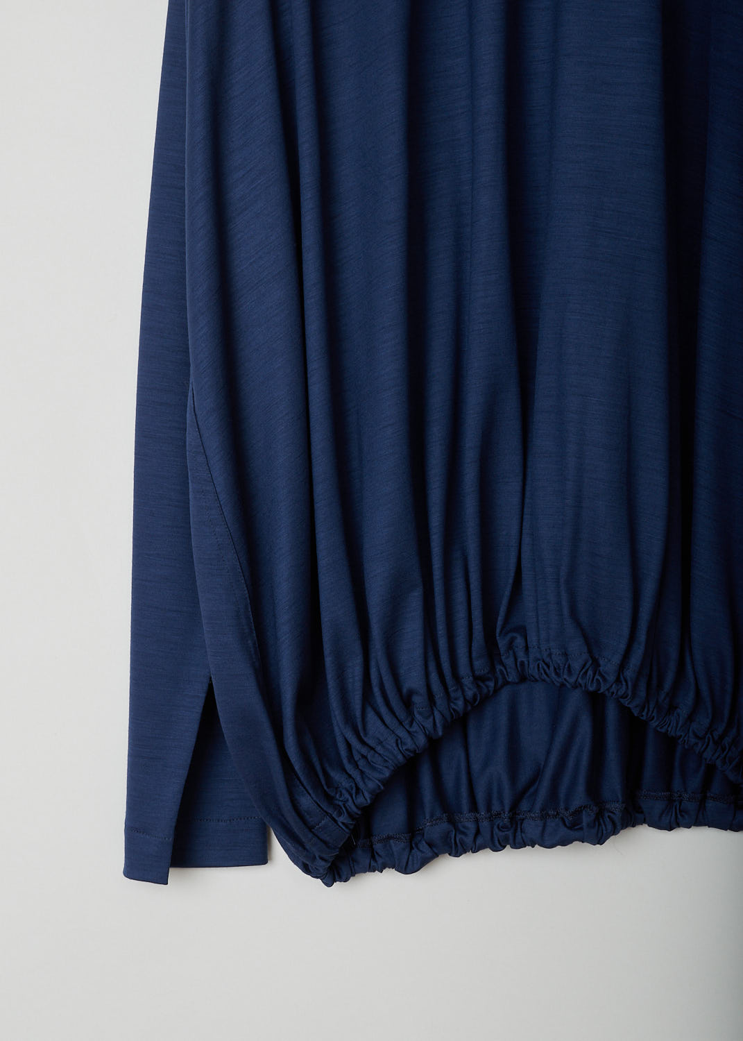 SOFIE D’HOORE, NAVY BLUE TOP WITH ELASTICATED WAISTLINE, BASSIA_WOJE_NAVY, Blue, Detail, This navy blue long sleeve top has a round neckline and dropped shoulders. Most noteworthy is the gathered elasticated hemline. 

