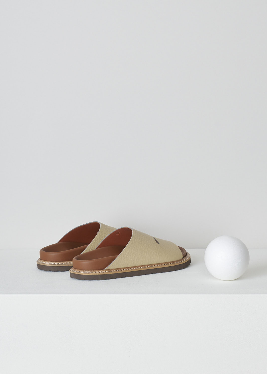SOFIE, Dâ€™HOORE FABIA SLIP-ON SANDALS IN STONE, FABIA_LNAT_STONE, Beige, Back, These slip-on sandals have a wide footbed with stitching along the soles. A broad strap with a horizontal cut-out goes across the vamp. These sandals have a round open-toe.
