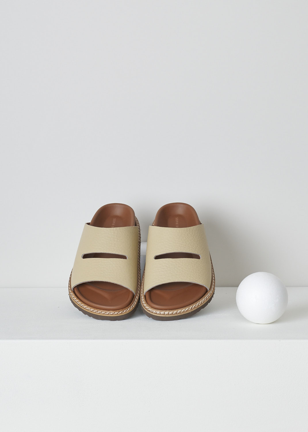 SOFIE, Dâ€™HOORE FABIA SLIP-ON SANDALS IN STONE, FABIA_LNAT_STONE, Beige, Top, These slip-on sandals have a wide footbed with stitching along the soles. A broad strap with a horizontal cut-out goes across the vamp. These sandals have a round open-toe.
