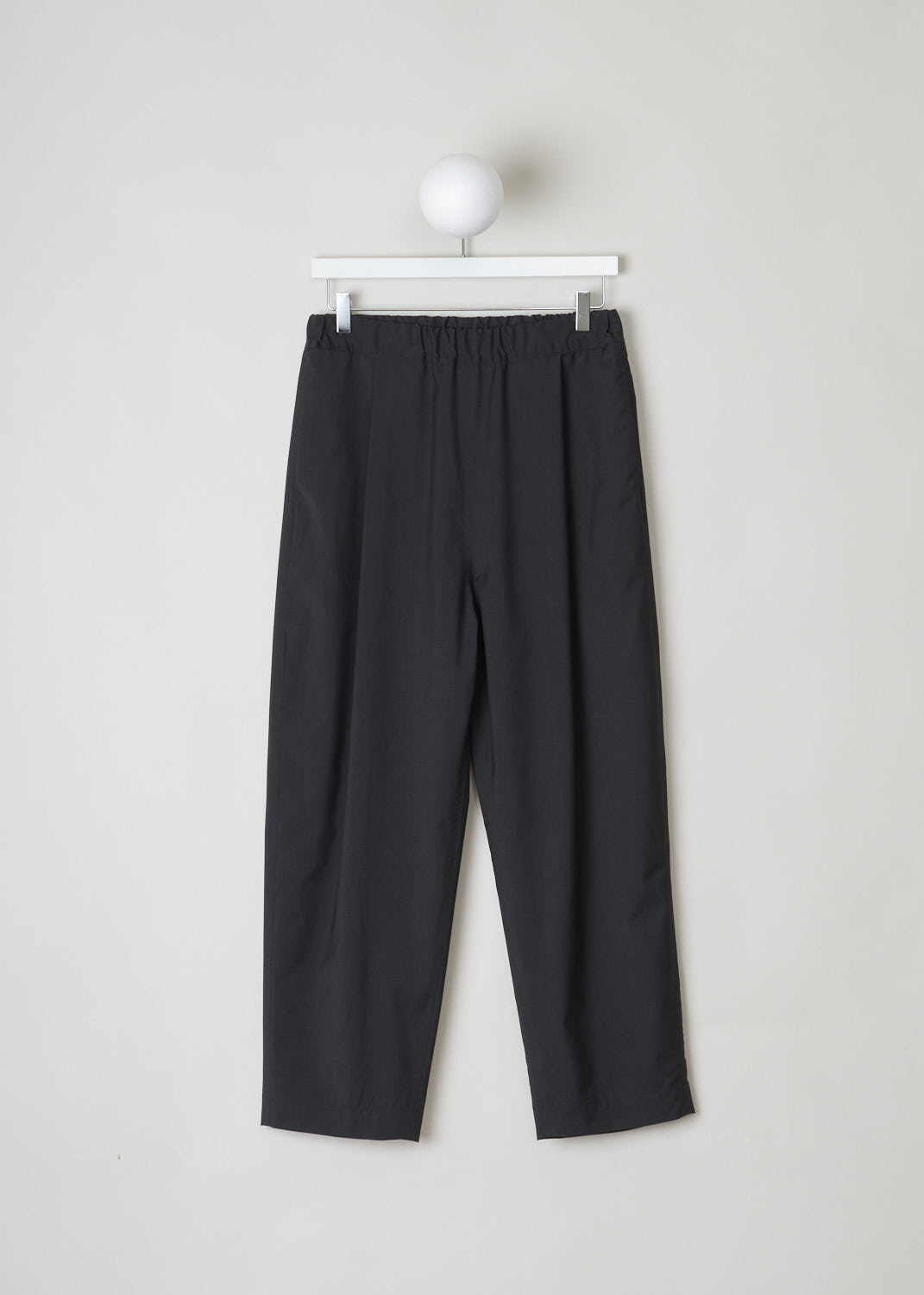 SOFIE Dâ€™HOORE, CHARCOAL PANTS WITH ELASTICATED WAISTBAND, S22_PATIENCE_WOOP_02_CHARCOAL, Grey, Front, These wool, charcoal colored pants have an elastic waistband with a white drawstring on the inside. Slanted pockets can be found on either side. In the back, a single patch pocket can be found. 
