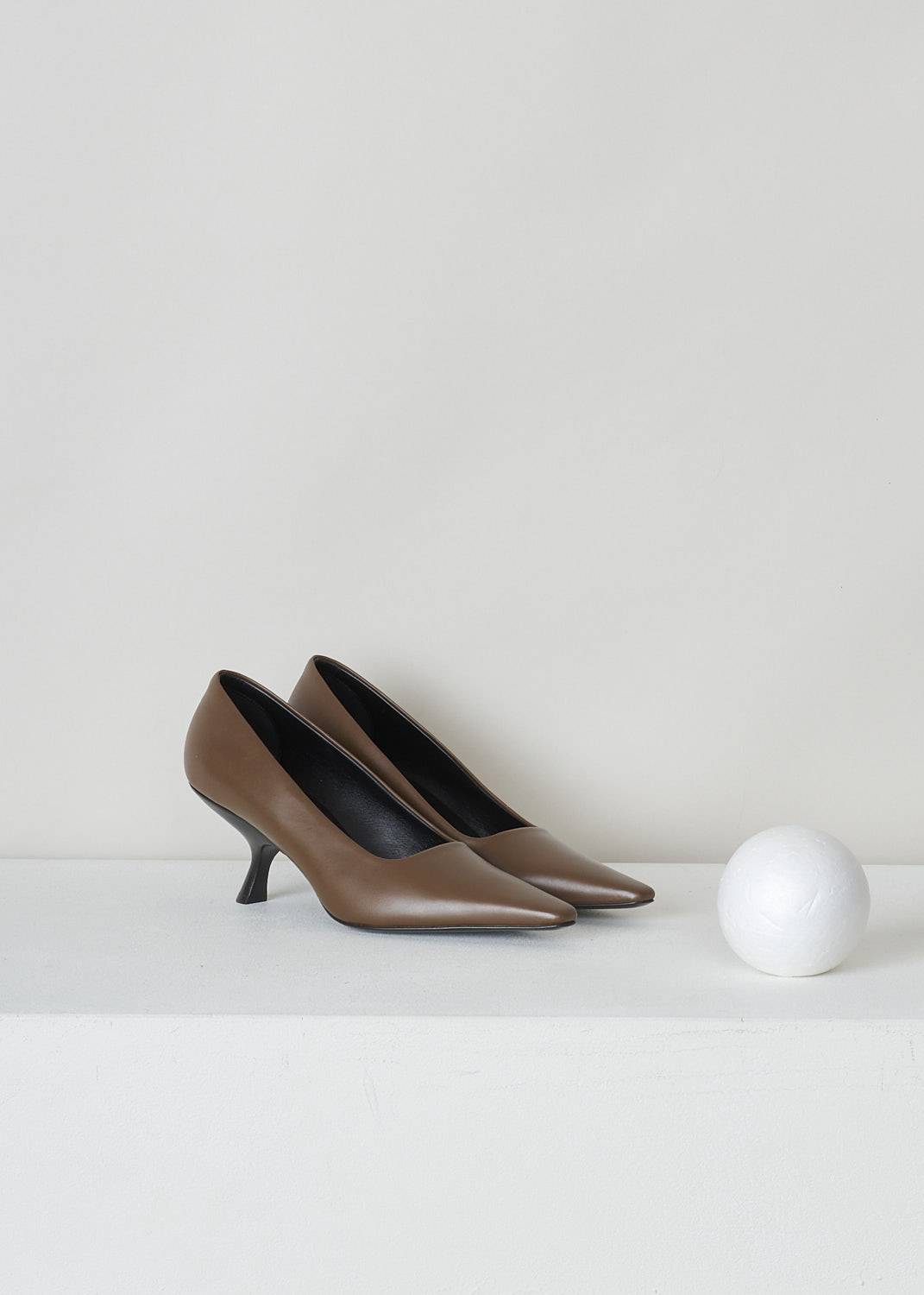 THE ROW, BROWN LEATHER KITTEN PUMPS, F1279_L52_CPR_KITTEN_PUMP_CIPRIA, Brown, Front, The brown slip-on kitten pumps have a squared pointed toe and a curved heel.  

