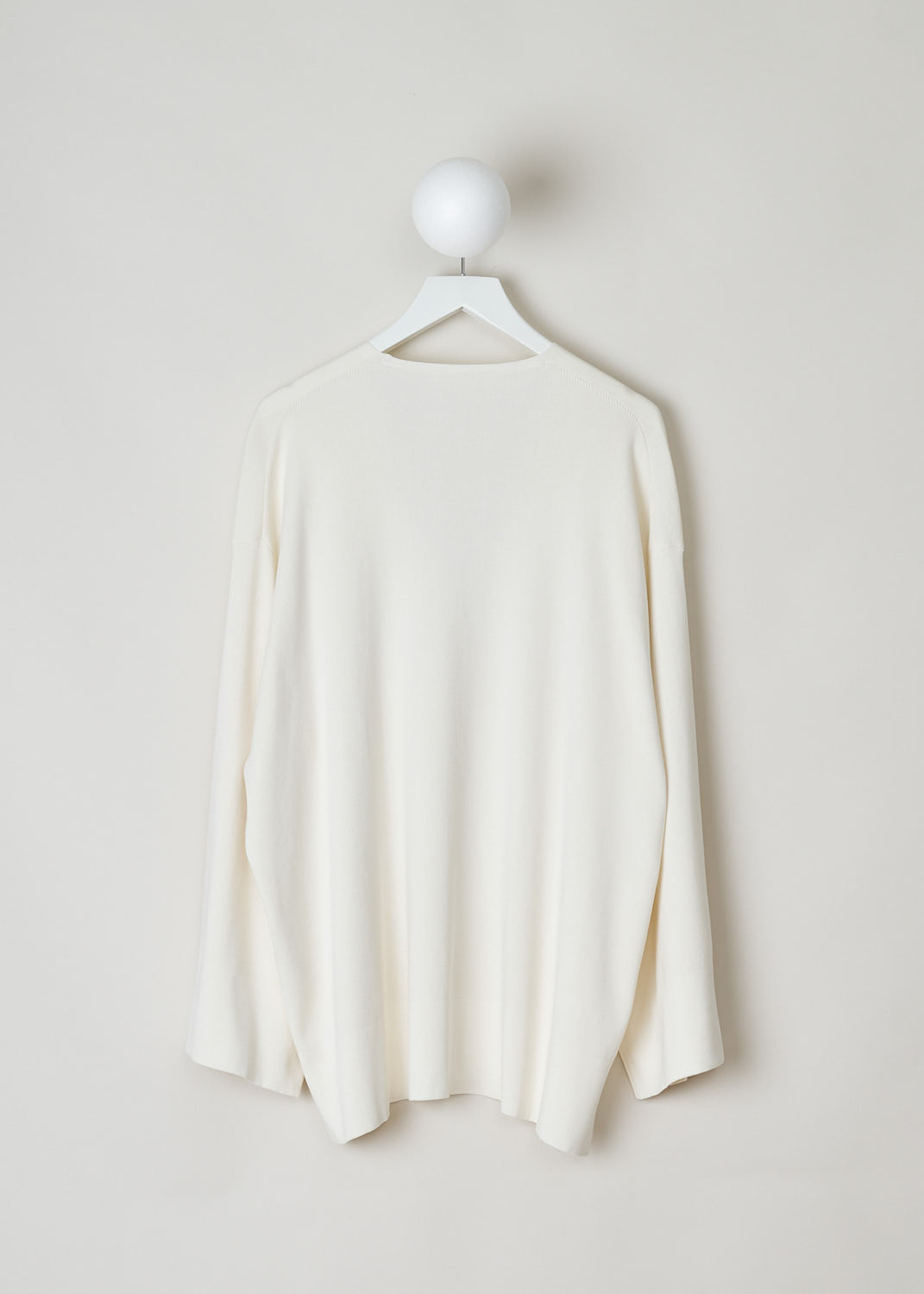 THE ROW, OFF-WHITE SWEATER, LESLI_TOP_3856Y252_IVORY, White, Back, This silk-blend top in off-white has a deep, rounded off V-neckline and slightly flared sleeves. The top has a broad hemline with small slits. The top has a wider silhouette.

