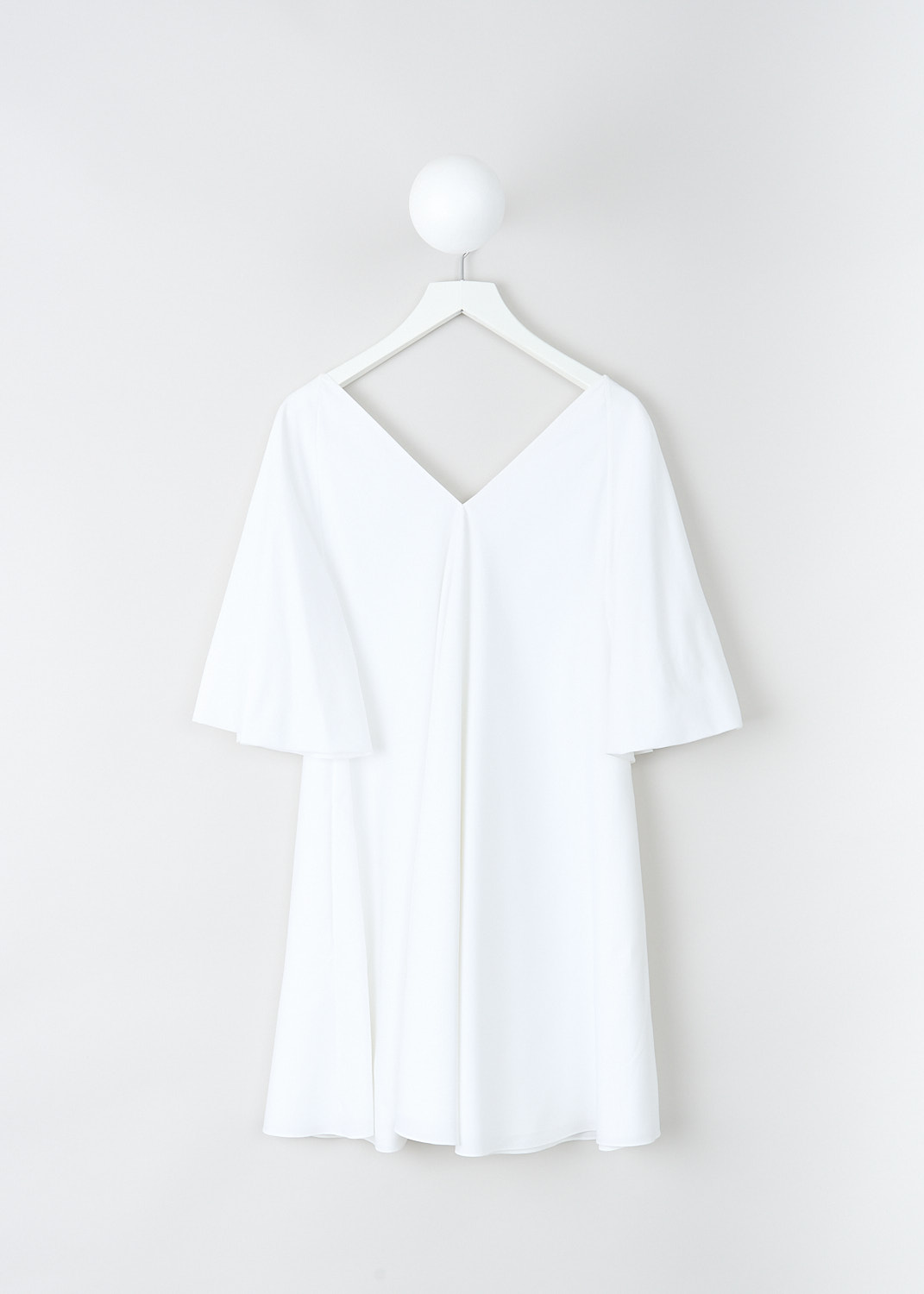 The Row, Lianne dress in Optic White, LIANNE_DRESS_3773N_W1017_OPTIC_WHITE, White, Back, This Optic White Lianne midi dress has a V-neck and back. The dress has short bell sleeves and an A-line silhouette.  The hemline is straight.
