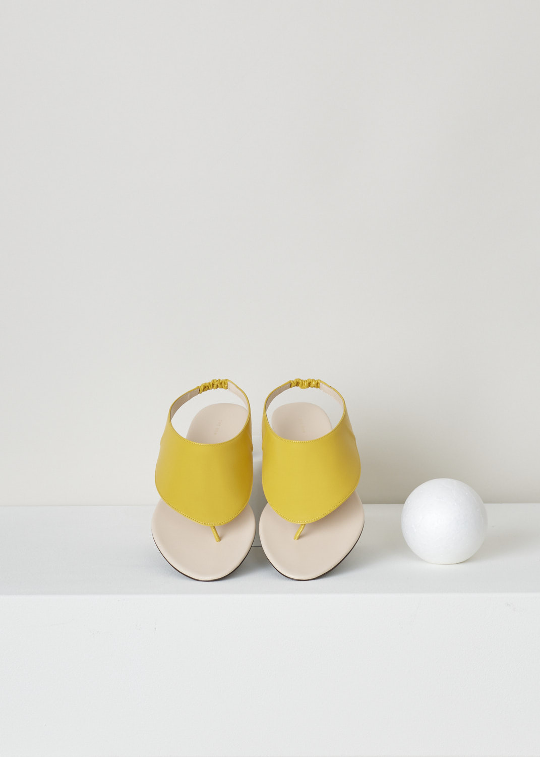 The Row, Mustard yellow ravello thong sandal, F1155_L35_MUS, yellow, top, Ravelo slip-on sandals from The Row. Coloured to the lovely shade of mustard yellow. Featuring a round and open toe vamp and comes with an elastic slingback strap. 