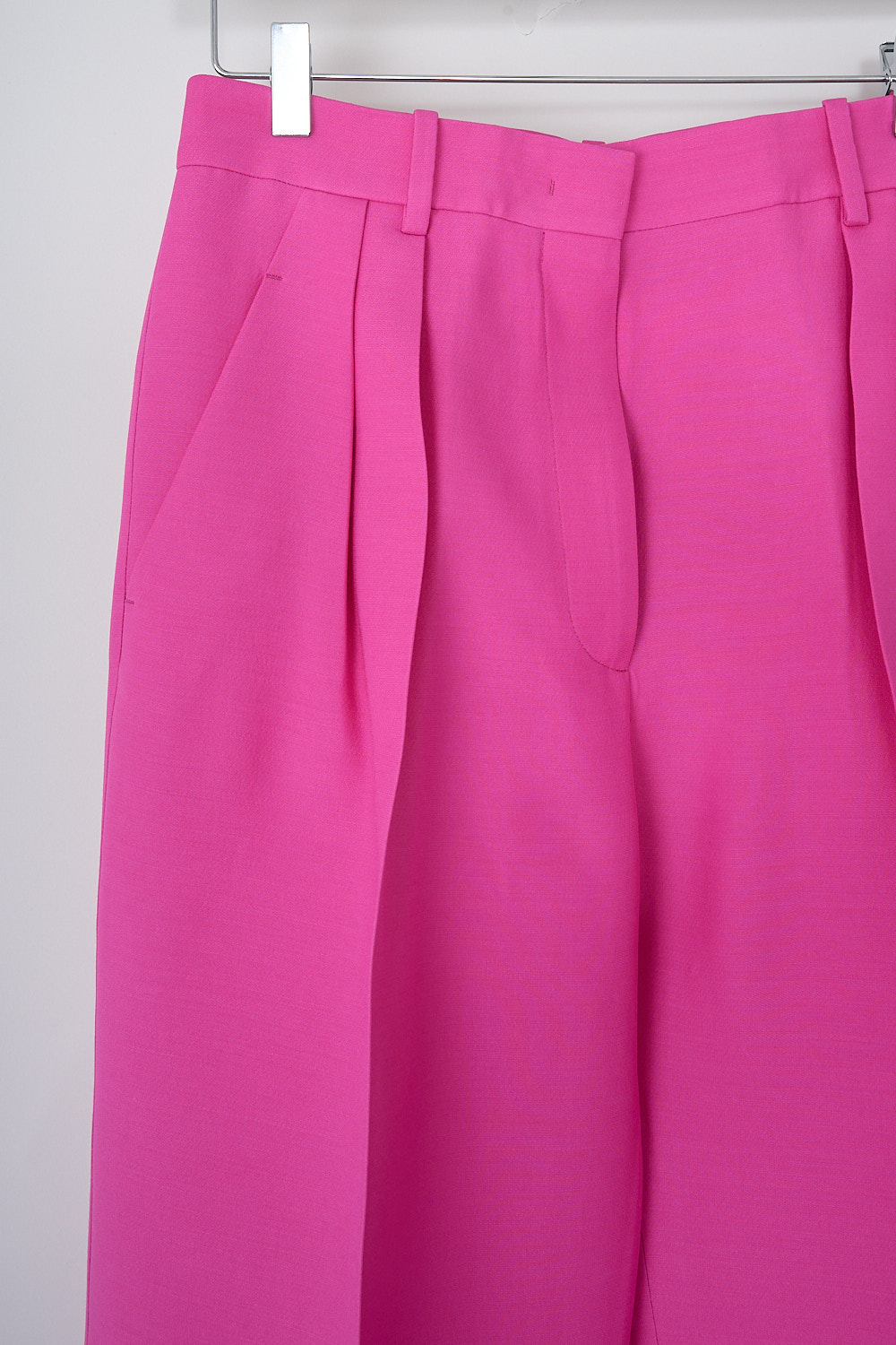 VALENTINO, PINK PP CRÊPE COUTURE PANTS, 1B0RB3Z51CF_UWT, Pink, Detail, These Pink PP high-waisted crêpe couture pants have a narrow waistband with belt loops. A concealed claps and zip function as the closure. Decorative pleats can be found on the front. The wide pant legs have an extra long length with pressed creases along the front and back. These pants have slanted pockets in the front and welt pockets in the back.
