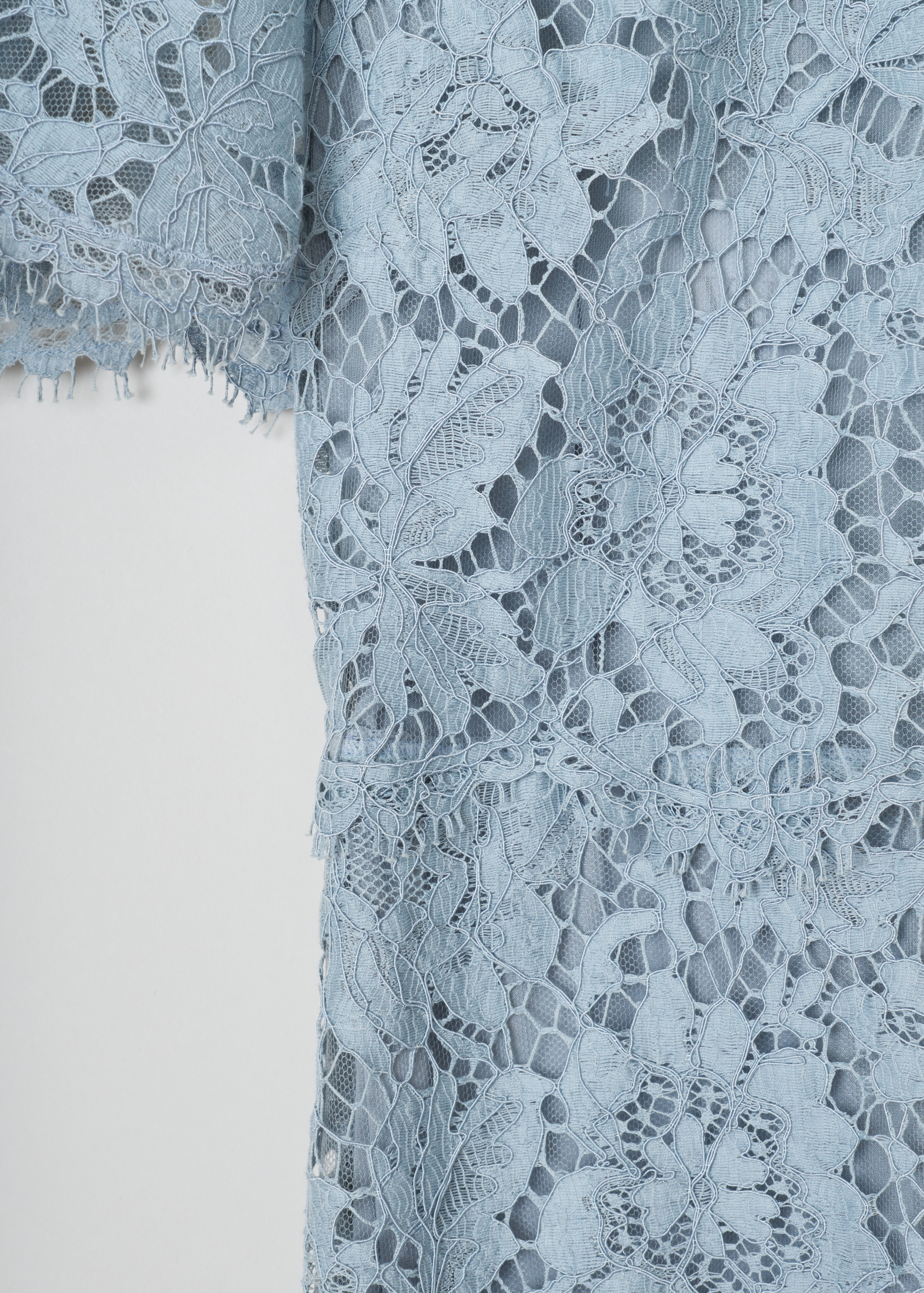 Valentino Light blue lace dress KB3VA6B61EC_A98 light blue detail. Light blue midi dress in beautiful cotton lace with wide short sleeves, a bodice with a close-fit neckline, an a-line skirt, scalloped hems and an invisible zip fastening on the back.